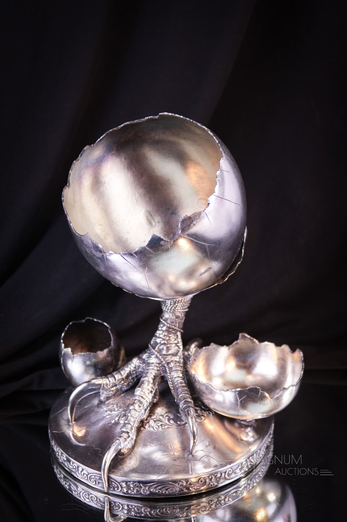 Pairpoint Ostrich Foot Silver Plate Smoking Set: Fine example of the wonderfully whimsical forms Pairpoint made in the Victorian era. This Ostrich foot and egg form smoking set is a foot above the rest. Piece is mongrammed as well. The set features