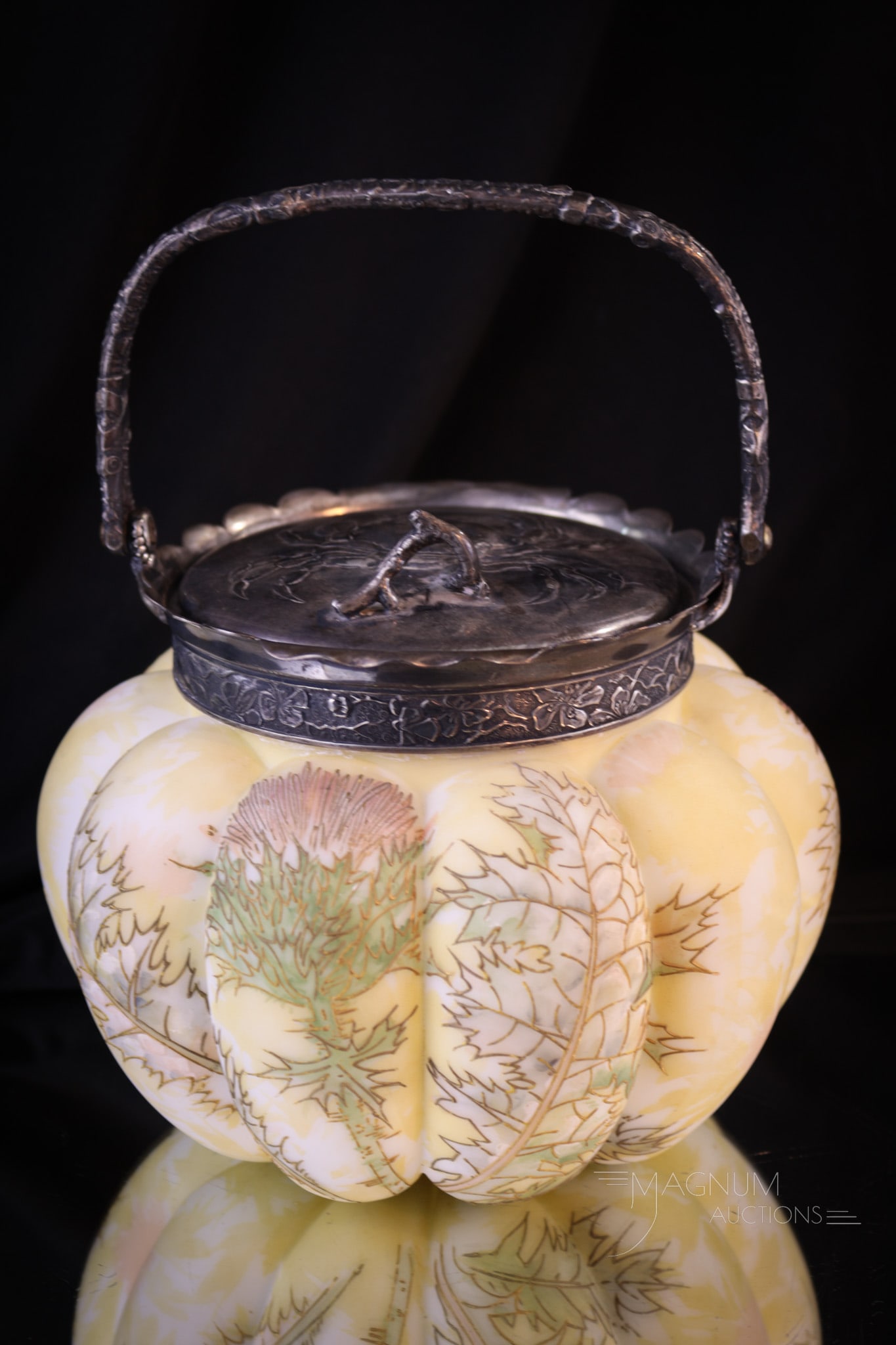 Mt. Washington Crown Milano Victorian Glass Biscuit Jar: Wonderfully pretty Victorian Mt. Washington Crown Milano biscuit jar. Jar features original mountings with repousse crab on lid and thistle flowers. Biscuit jar measures 6" tall.