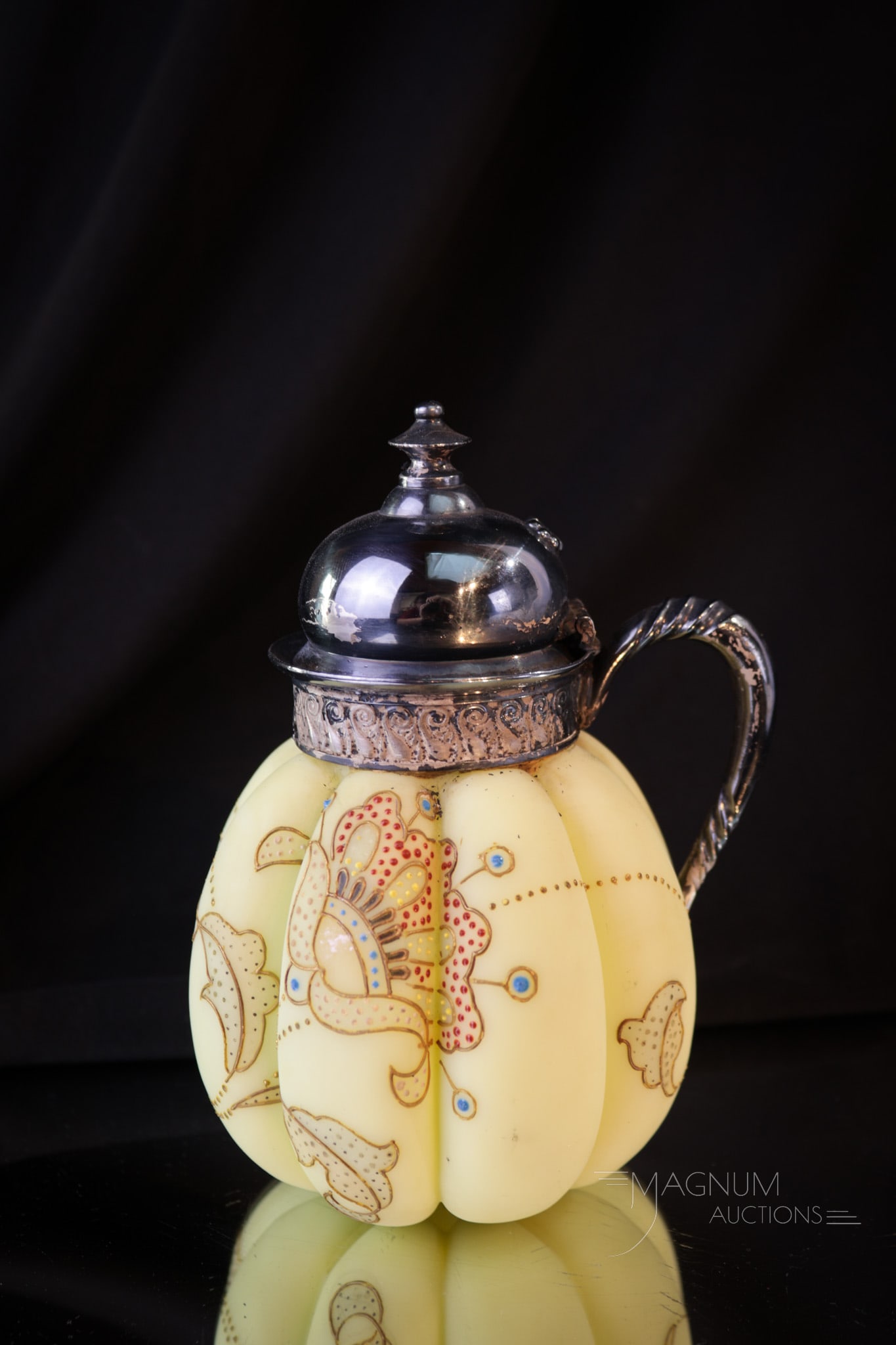 Mt. Washington Crown Milano Victorian Glass Syrup Pitcher: Beautiful Mt. Washington glass Crown Milano Victorian syrup pitcher. This fine piece has gilt enameled large petit point florals. Syrup measures 5 3/4" tall. Provenance: This item is from the private 