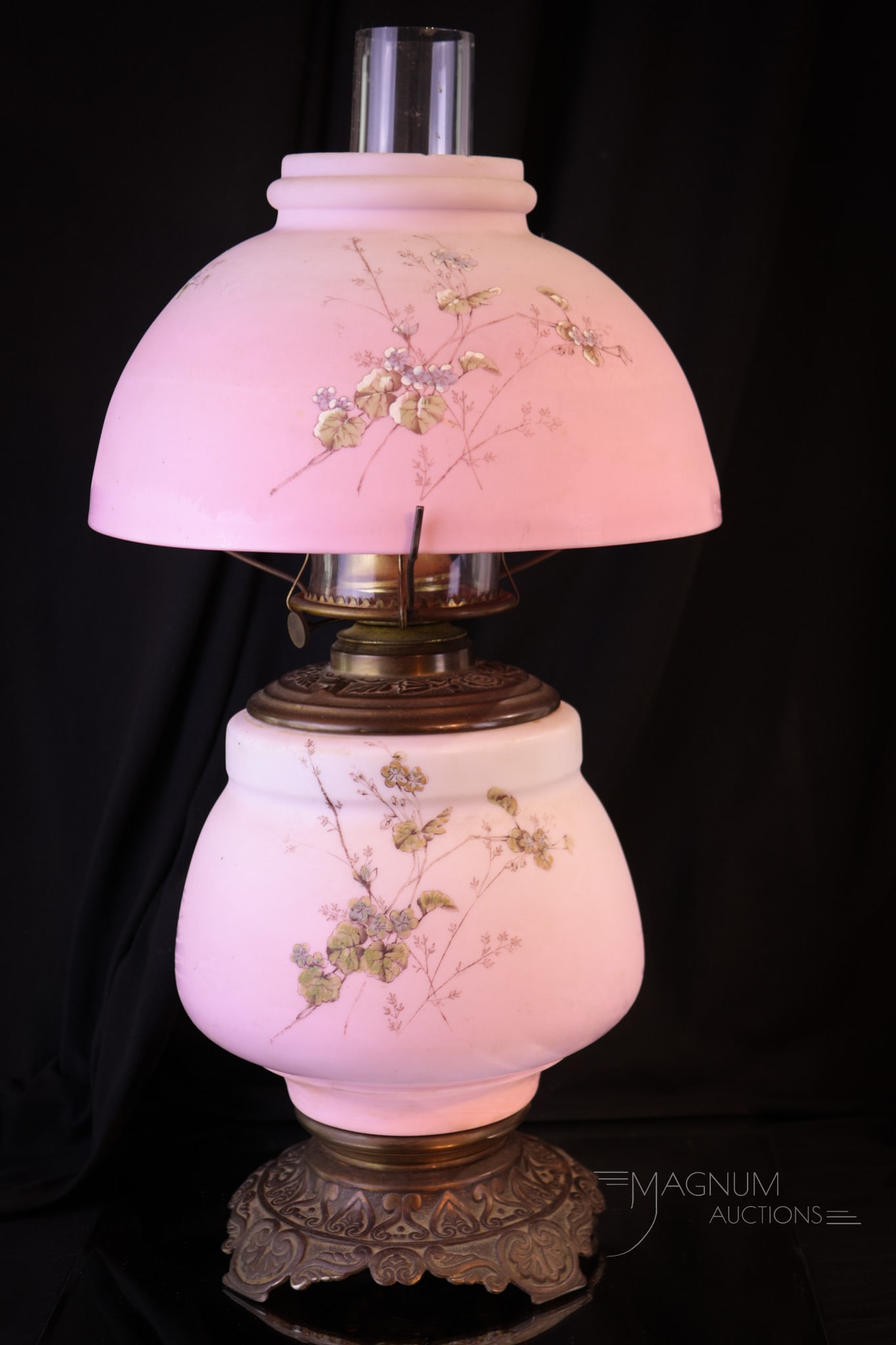 Peachblow Victorian Glass Decorated parlor Oil Lamp: A Rare find folks. This lamp in peachblow glass has beautiful fired peachblow coloring. Delicate florals around the shade and base compliment it even more. A fine example. Lamp measures 17 1/2" tall, 