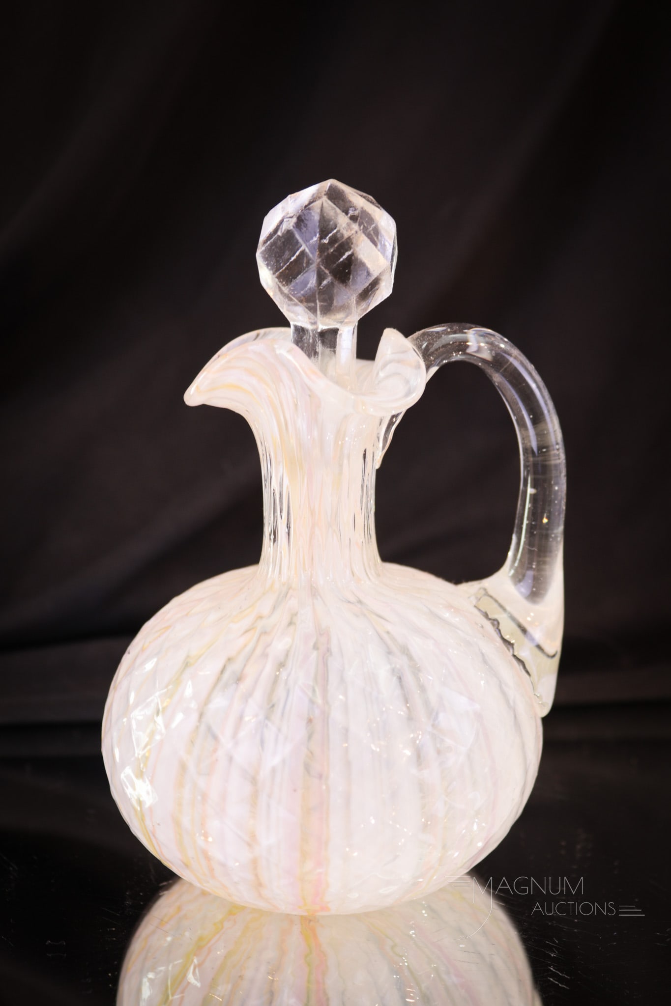 Rare Phoenix Harrach Rainbow Diamond Quilt Victorian Glass Cruet: A rare find in a Victorian glass cruet. This piece is attributed to either Phoenix or Harrach glass. Beautiful external diamond quilt pattern with rainbow stripe coloring internally. Cruet measures 5"