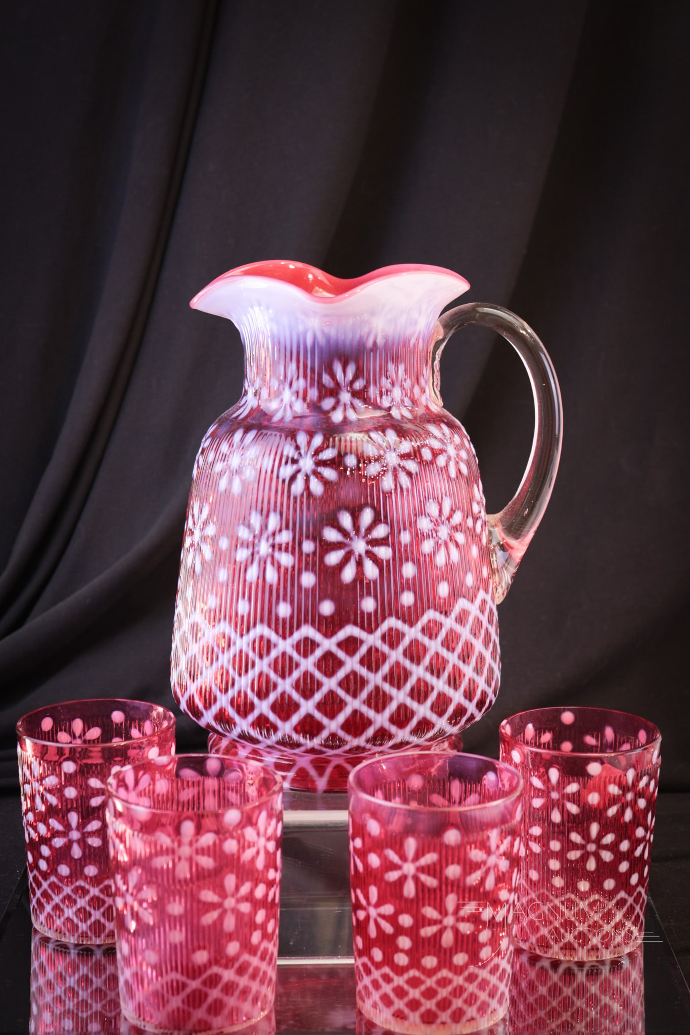 5 pc Northwood Cranberry Opalescent Christmas Snowflake Water Set: Perfect Christmas present to yourself! This fine cranberry opalescent Northwood pitcher and tumblers is in the Christmas Ribbed Snowflake pattern. Each with distinct opal and rich coloring. Honey, is 