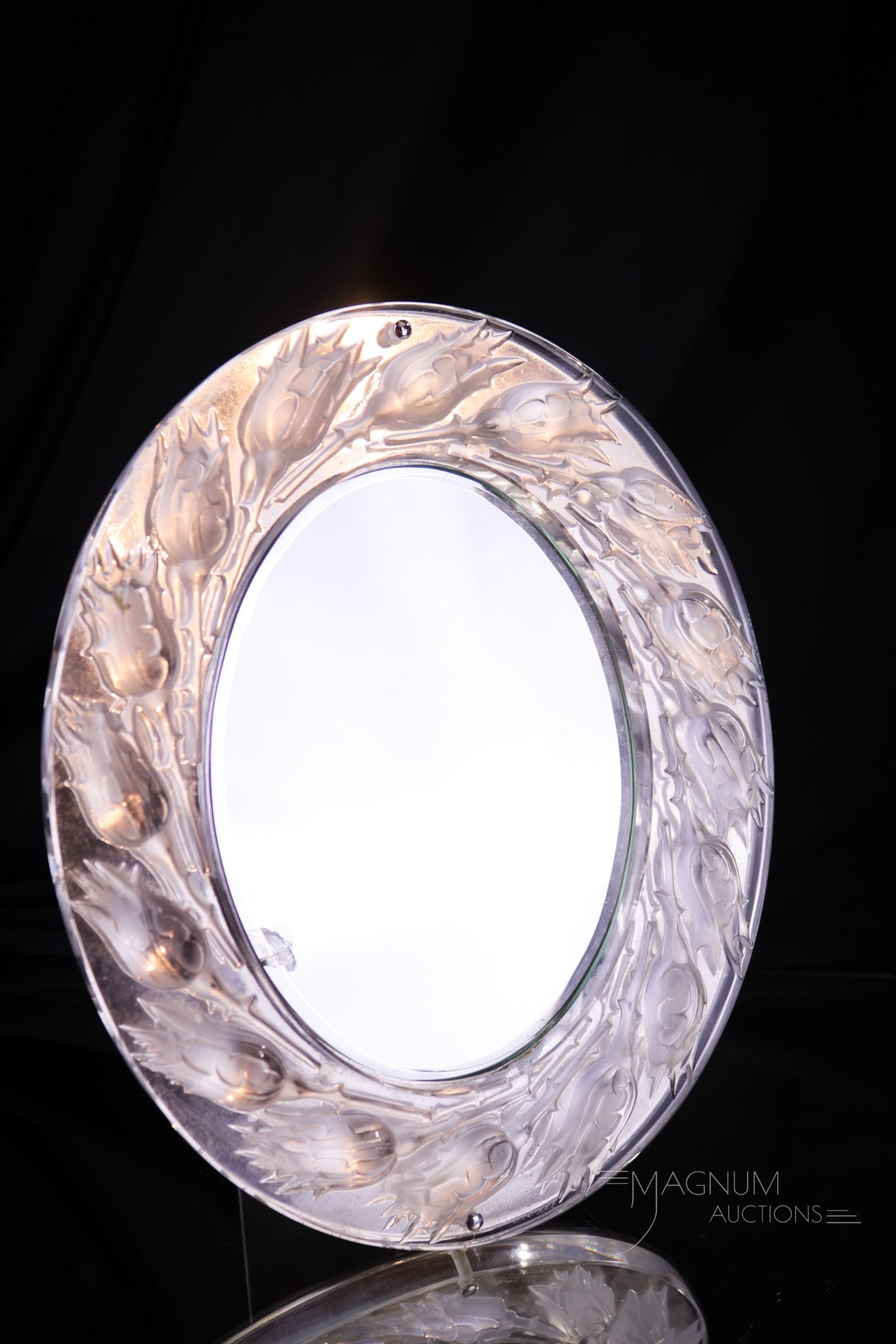 Lalique "Boutons de Roses" Crystal Table Vanity Mirror: The best Lalique crystal table vanity mirror in the "Bouton de Roses" pattern. This fine example with great detail. Piece measures 10" tall, 8" wide. Crystal frame is undamaged. Mirror with concoidal 
