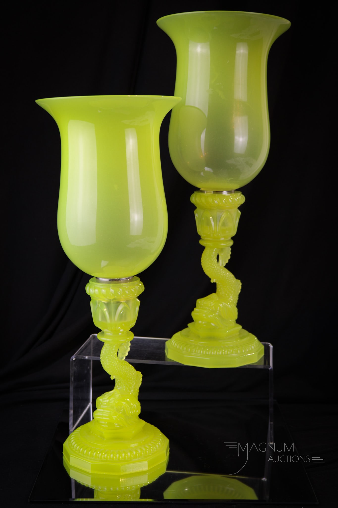 Rare Pair Portieux Vallerysthall Uranium Vaseline Opaline Dolphin Lusters: A rare find indeed. A matched pair of Portieux Vallerysthall uranium vaseline opaline glass lusters in dolphin form. Each with matching hurrican chimneys. Each measures 16" tall.
