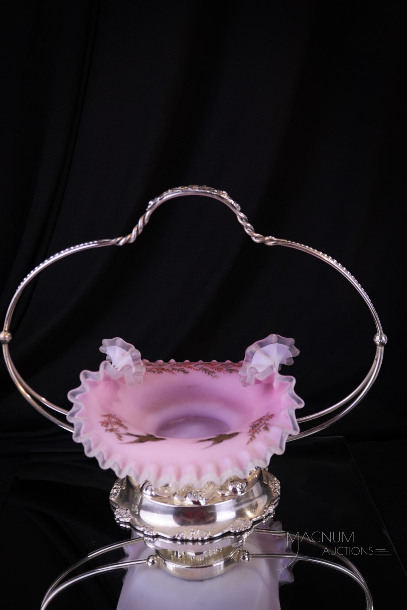 Pairpoint Silverplate Victorian Enameled Glass Brides Bowl Basket: Very ornate signed Pairpoint silverplate holder complete with the original bowl in pink cased satin glass enameled to the hilt. This fine piece stands 10" tall, 11 1/2" wide.