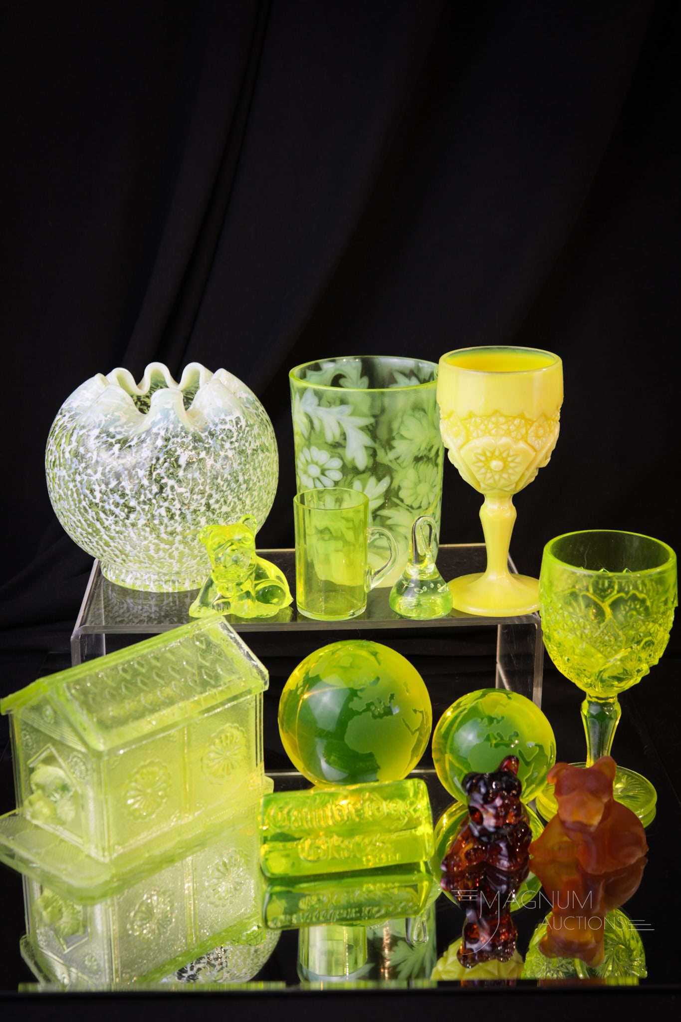 13 pc Lot "Luv of Vaseline" Glass: Thirteen fine finds in vaseline glass "Expressions of love." Lot includes pieces by Fenton, Dugan and more.Tallest measures 4 1/2". A crack is noted to the lid of the doghouse.