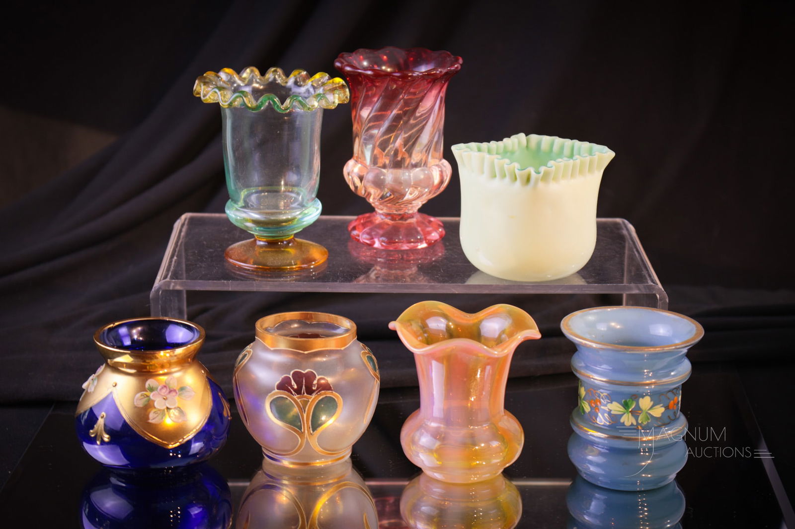 7 pc Lot Art Glass Toothpick Holders Monot Stumph Baccarat & More: Seven lovely examples of Victorian art glass toothpick holders. Makers such as Baccarat and Monot Stumph and more make up this lot of devine pieces. Tallest measures 3". Provenance: from the estate o