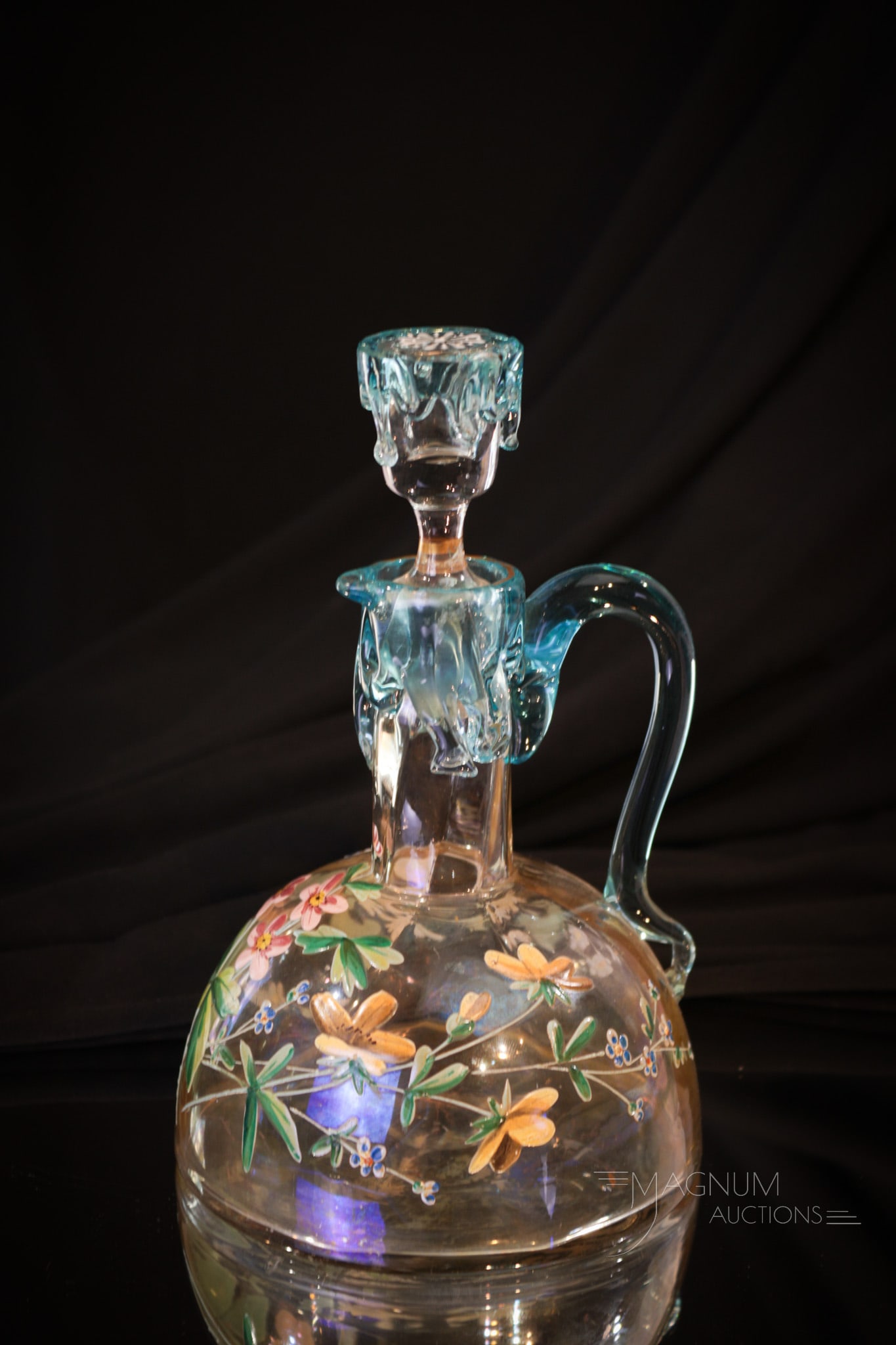 Moser Applied Glass Victorian Enameled Iridescent Cruet: Wonderfully rare Moser enameled iridescent Victorian glass cruet complete with original stopper. Cruet features applied blue dripping glass on the cruet rim and stopper. Piece is eloborately decorated