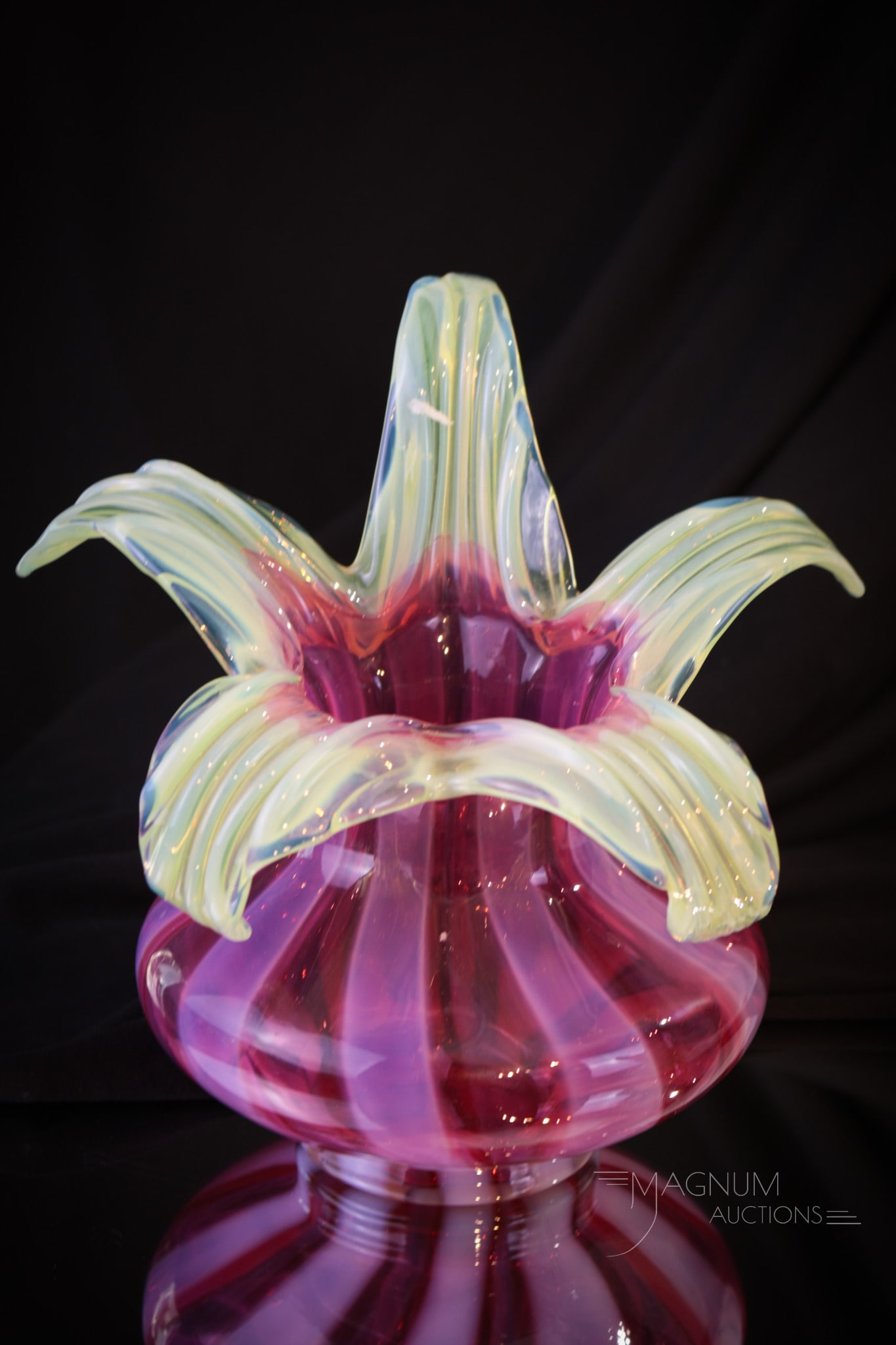Cranberry Opalescent Victorian Vaseline Octopus Vase: Gorgeous cranberry opalescent vaseline glass octopus vase. This fine example has strong coloring and great form. Vase measures 7" tall.
