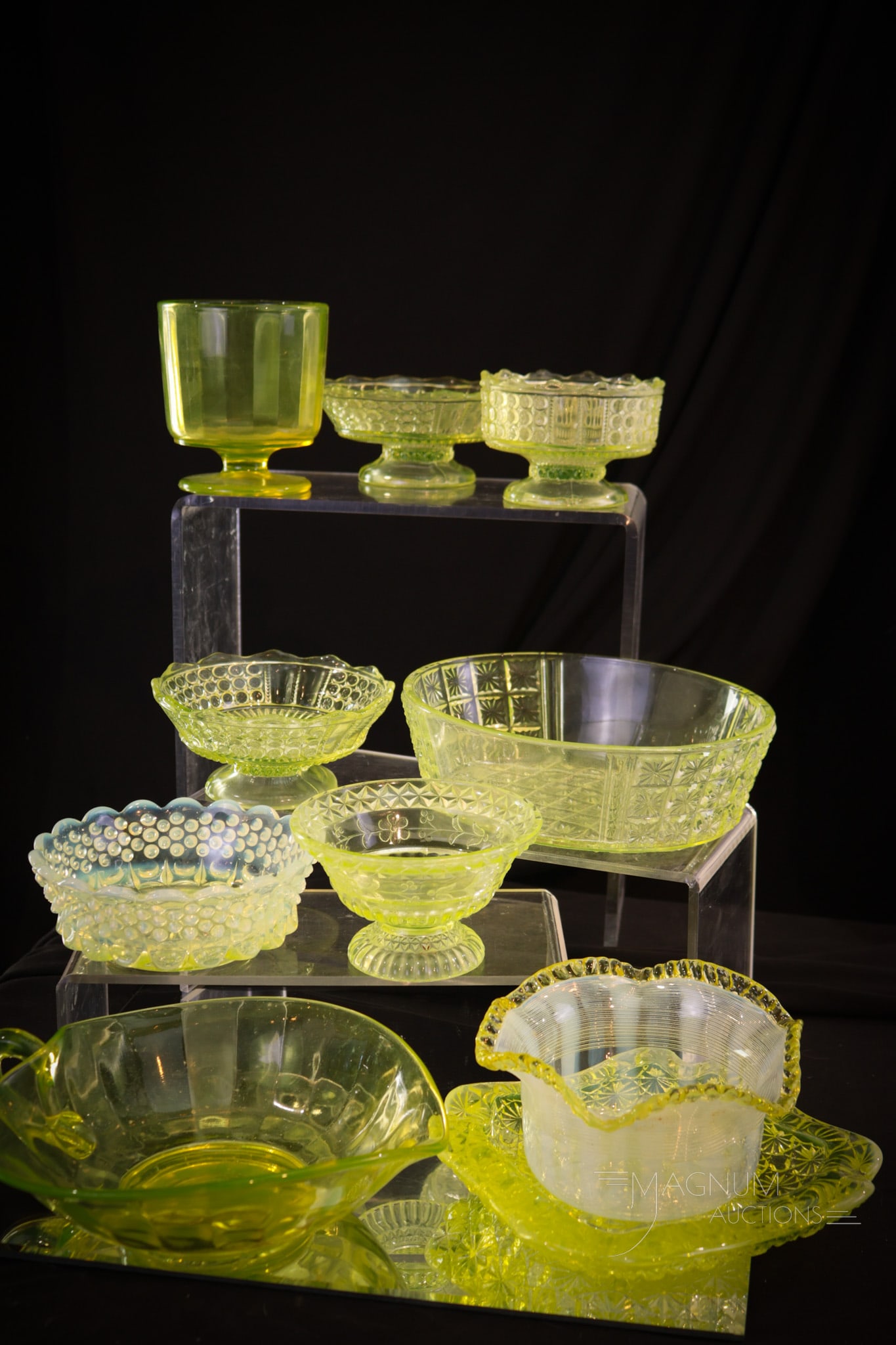 10 pc Lot Victorian & More Vaseline Glass Bowls: Select offering of ten Victorian and more vaseline glass bowls. Largest measures 2" tall, 6" diameter. Two of the Victorian berry bowls exhibit chips to the foot of each.
