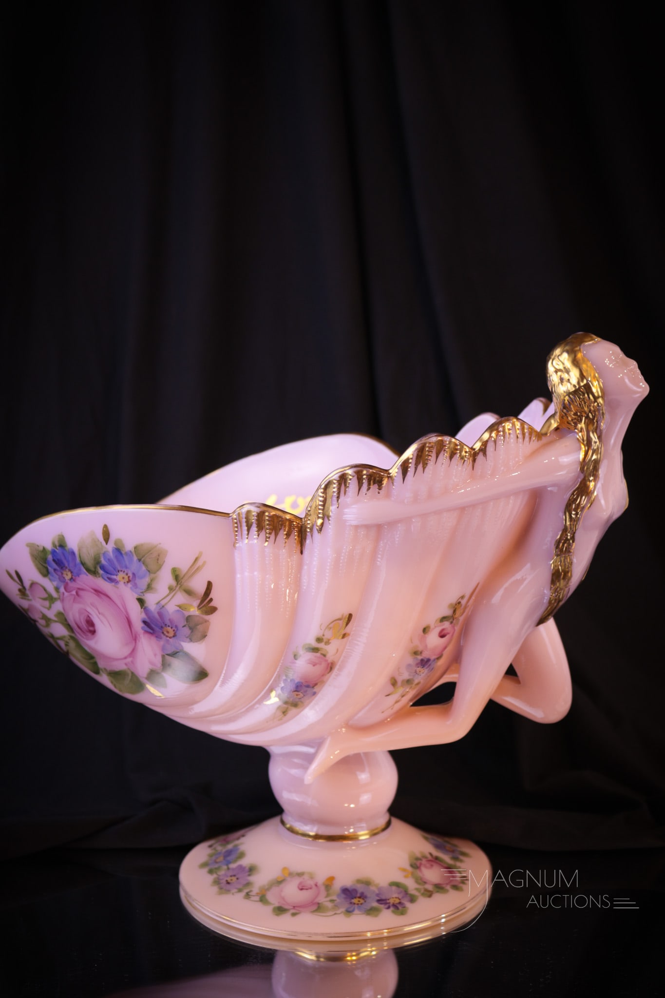 Cambridge Crown Tuscan Charleton Glass Nude Flying Lady Bowl: Another fine example of the Cambridge glass Flying Nude Lady bowl. This bowl is in Crown Tuscan color with Charleton decoration. Bowl measures 9" tall, 11" long.