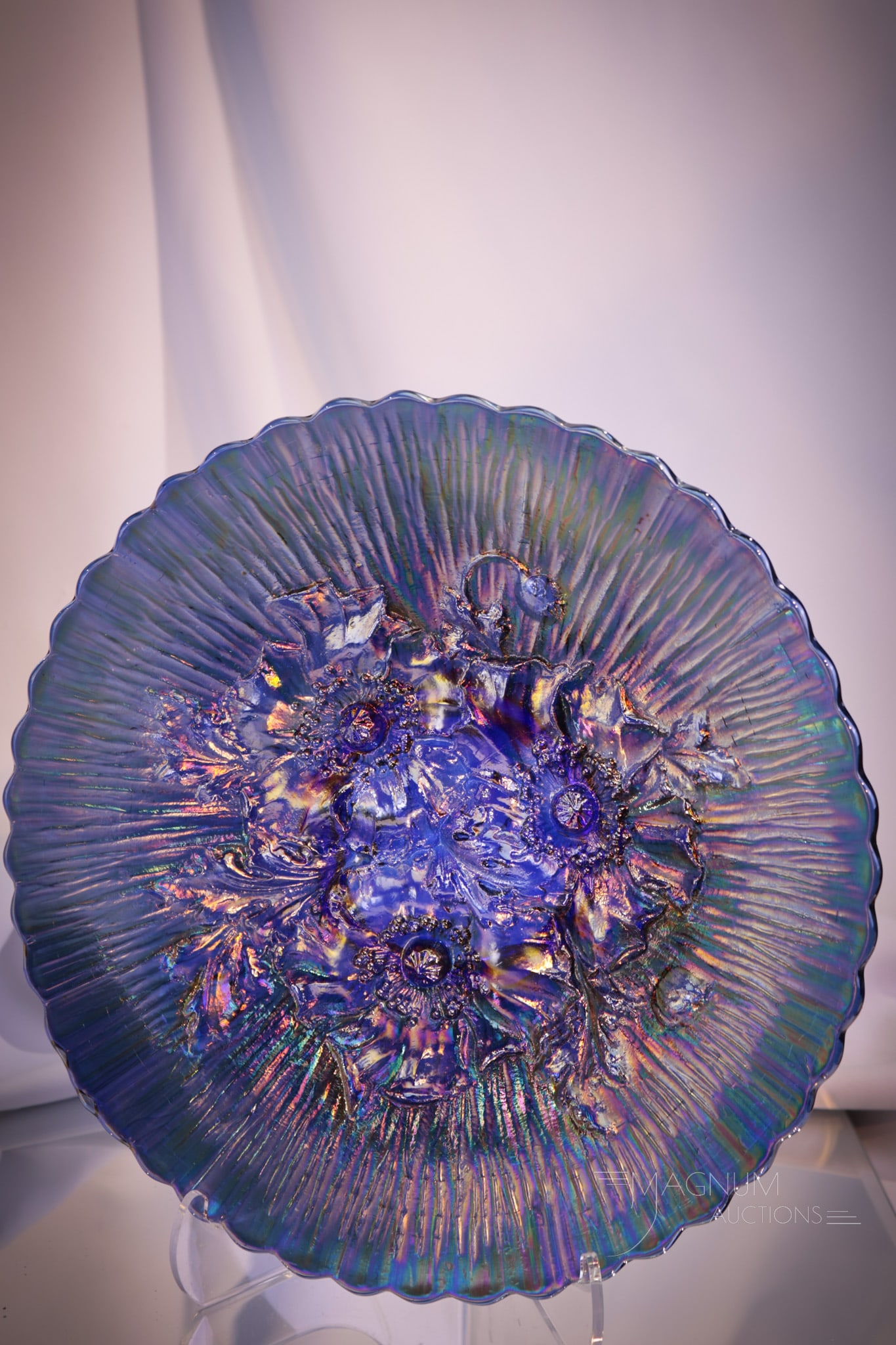 Northwood Blue Carnival Glass Poppy Show Plate: Vivid blue Northwood Carnival Glass "Poppy Show" Plate. Plate has perfect iridescence and coloring. Measures1 1/2" tall, 9 1/4" diameter.
