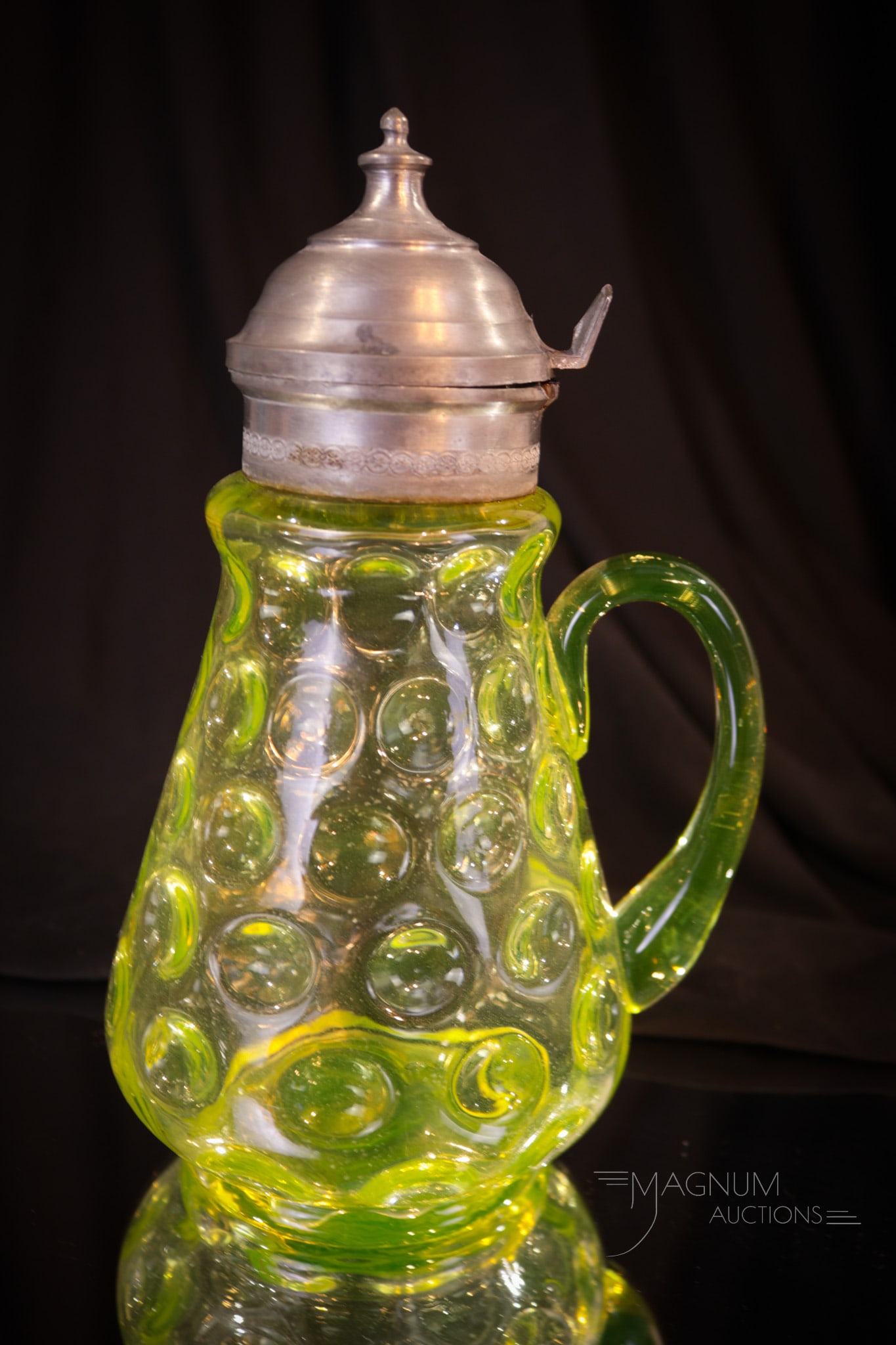 Hobb's Vaseline Inverted Thumbprint Victorian Syrup Pitcher: Seldom found Hobb's Victorian vaseline glass Inverted Thumbprint syrup pitcher. This piece has lovely coloring and boy she lights up under black light! Syrup measures 7" tall.