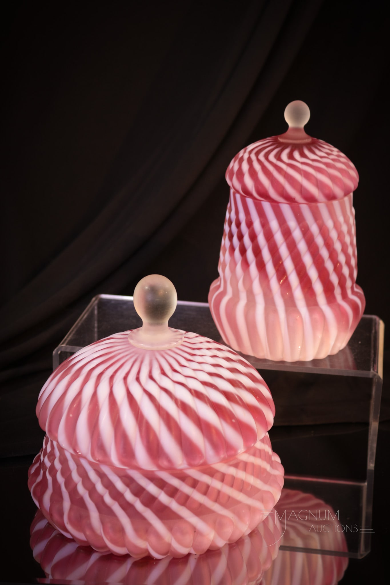 2 pc Lot Northwood Cranberry Opalescent Satin Glass Sugar & Butter: Luscious satin finish is found on both examples in this lot of Northwood "Chrysanthemum Base Swirl" pattern in cranberry. Here we have a covered sugar along with the covered butter. Tallest measures 6