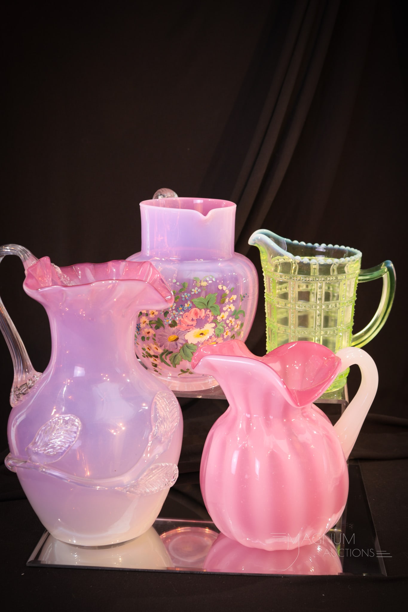 4 pc Lot Murano Italian Art Glass Opalescent & More Glass Pitchers: Four unique examples of Murano and more in this lot. Lot is comprised by a couple of Murano Italian art glass pitchers. One with applied leaf vine. The other with pronounced ribbing. The third pitcher