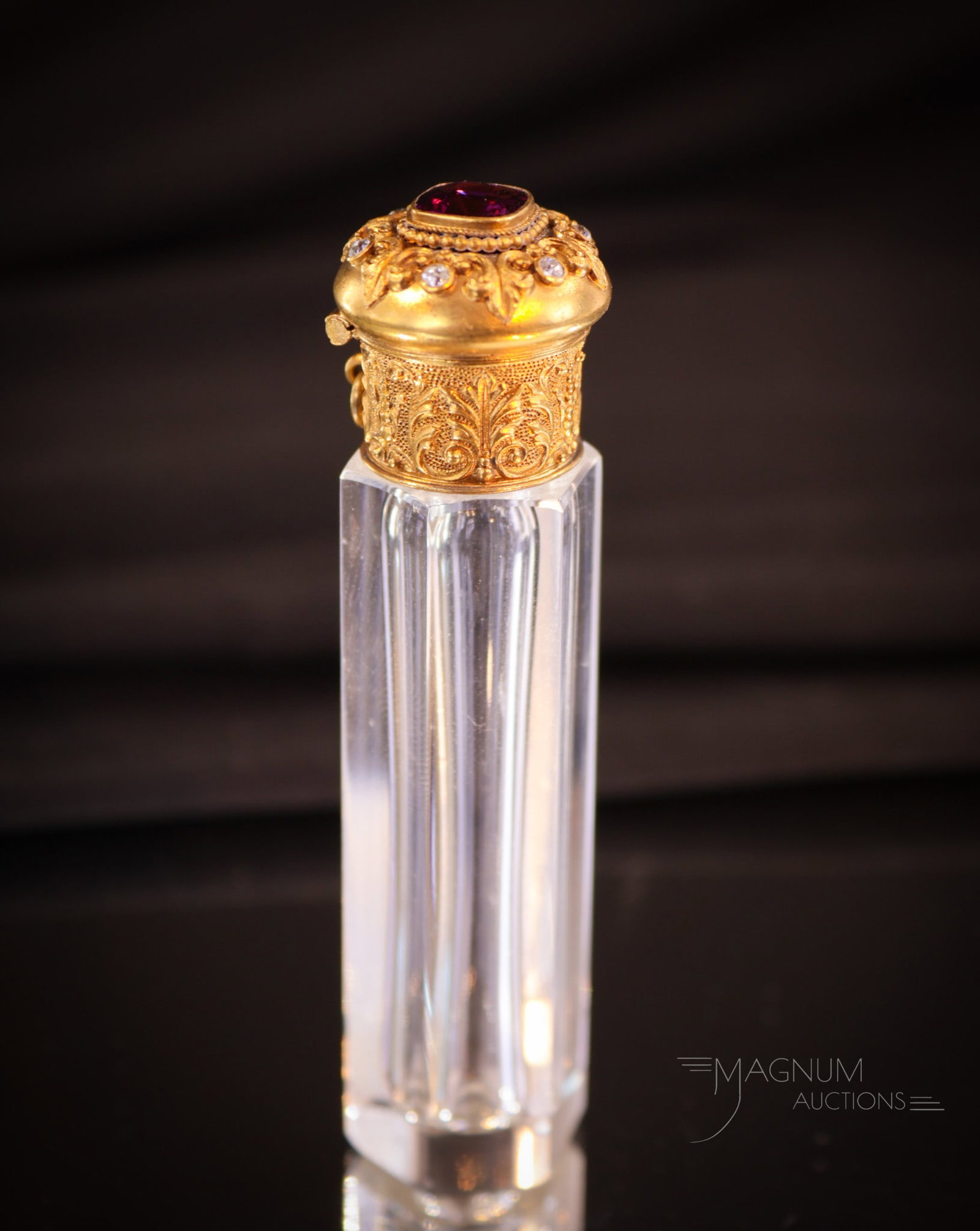 Antique 14K Gold Diamond Grape Garnet Perfume Bottle: Another lovely in our lineup of perfumes. This perfume is fitted with a 14K yellow gold hinged top set with daimonds and a grape garnet. Marked 14Kinside the lid. This fine example is just beautiful. 