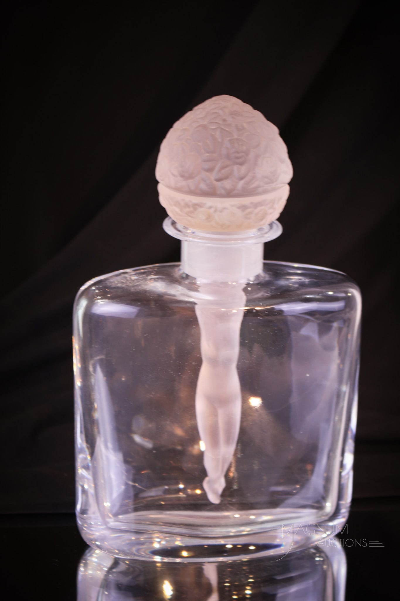 Czech Hoffmann Glass Cologne Bottle: Beautiful Czech Hoffmann glass colorgne bottle in clear and frosted glass. This is a large cologne bottle that features clear body and frosted stopper. Dauber of the bottle is a full figured female nu