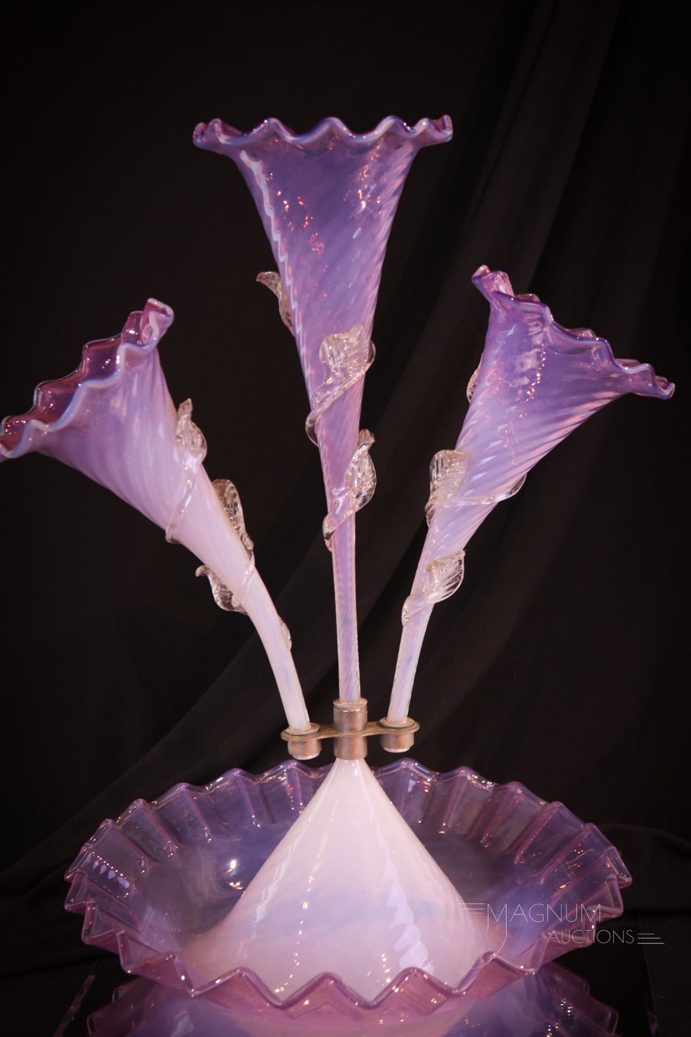 Italian Murano Art Glass Pink Opalescent Epergne: Showy Italian Murano art glass pink opalescent epergne. Epergne features applied glass foliage and vines. Piece measures 18" tall.