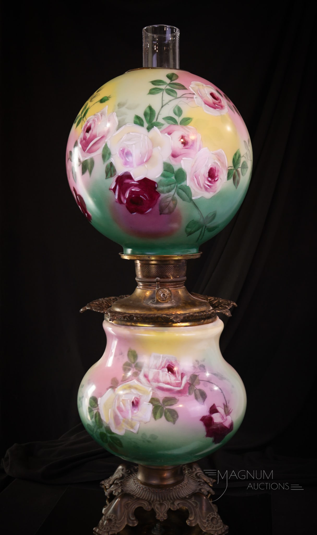 Victorian Garden Roses Gone with the Wind Parlor Oil Lamp: Gorgeous Victorian Gone with the Wind parlor oil lamp. This lamp is decorated with cascading roses and in a beautiful color scheme of pinks, yellows, and aqua green. Lamp measures 23 1/2" tall. Lamp r