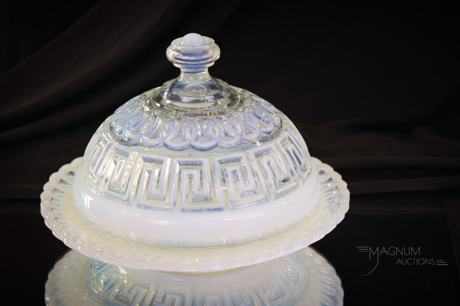 Fostoria Consolidated Double Greek Key Butter Dish: Beautiful find folks! This scarce butter dish is in the Fostoria Consolidated "Double Greek Key" pattern. This example is in nice strong crystal opal. Butter dish measures 5 1/2" tall.
