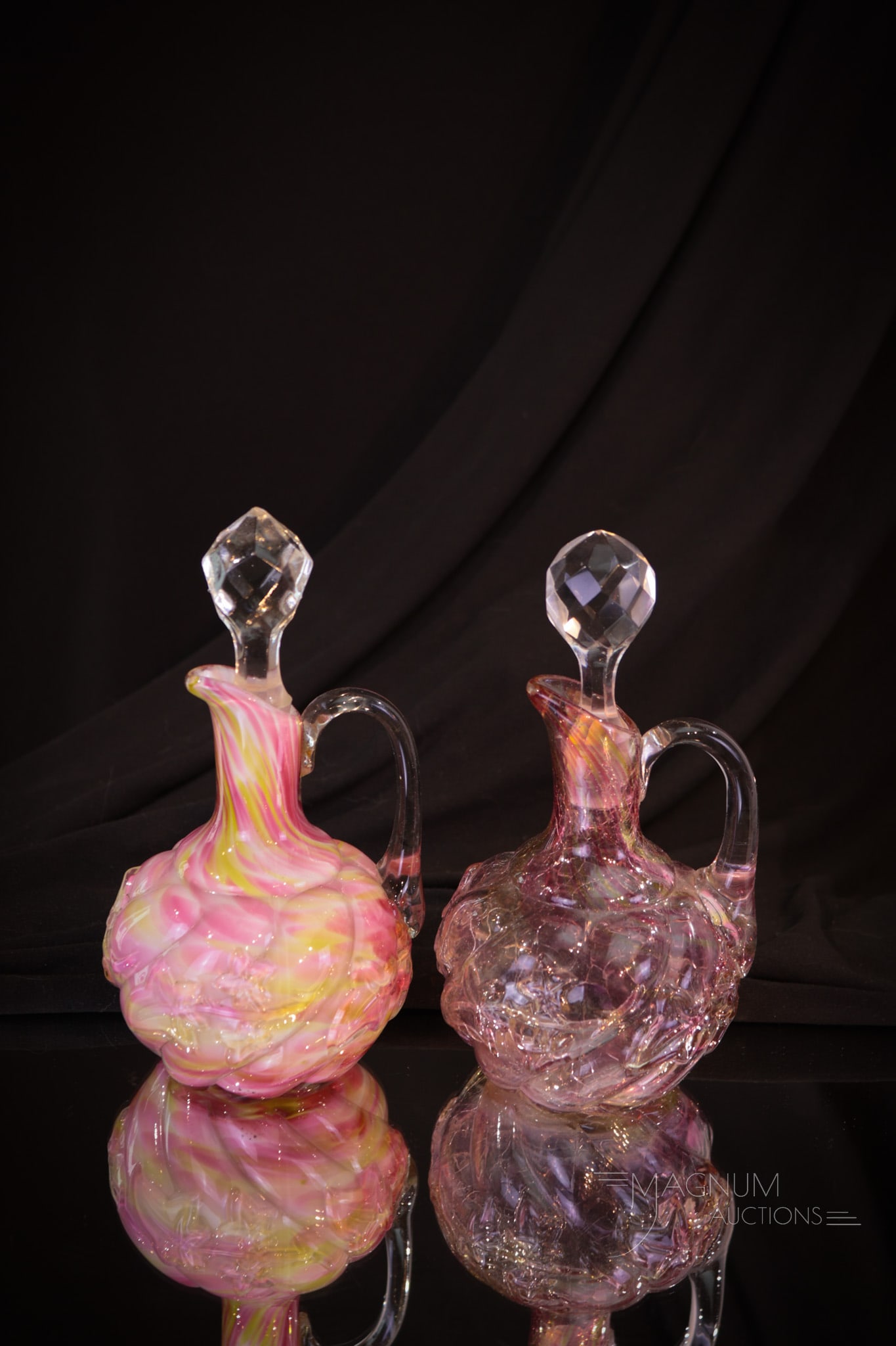 2 pc Lot Northwood Royal Ivy Victorian Glass Splatter Cruets: Two fine examples of Northwood Victorian glass cruets. Both are in the Royal Ivy pattern. One in cased spatter. One in rainbow craquelle spatter. Tallest measures 7".