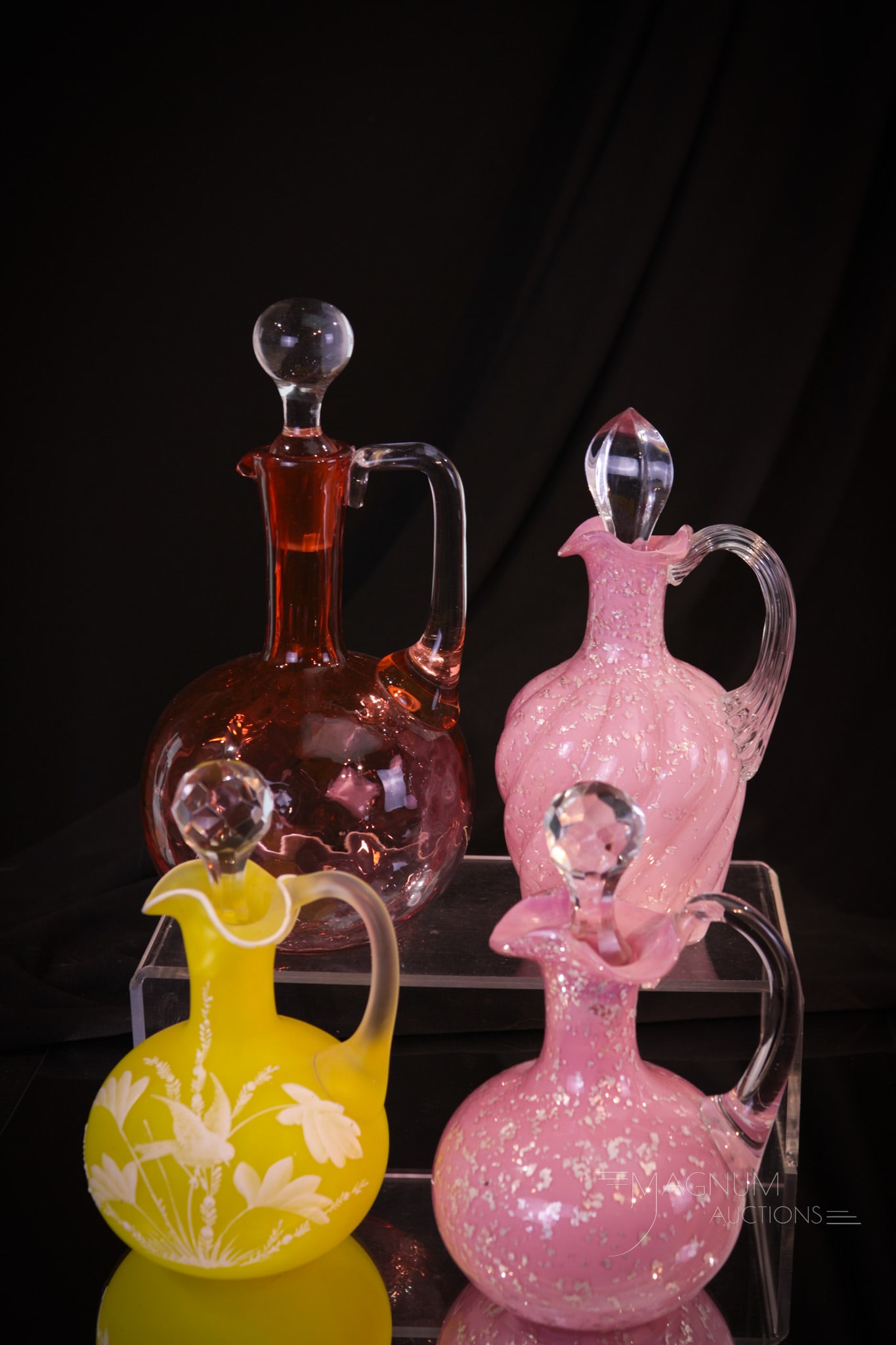 4 pc Lot Victorian Glass Cruets Phoenix & More: Four desirable attributed to Phoenix glass cruets found in this lot. Featured first is a yellow Florentine cameo glass. The second is an orange colored diamond quilt example. The third and fourth are 