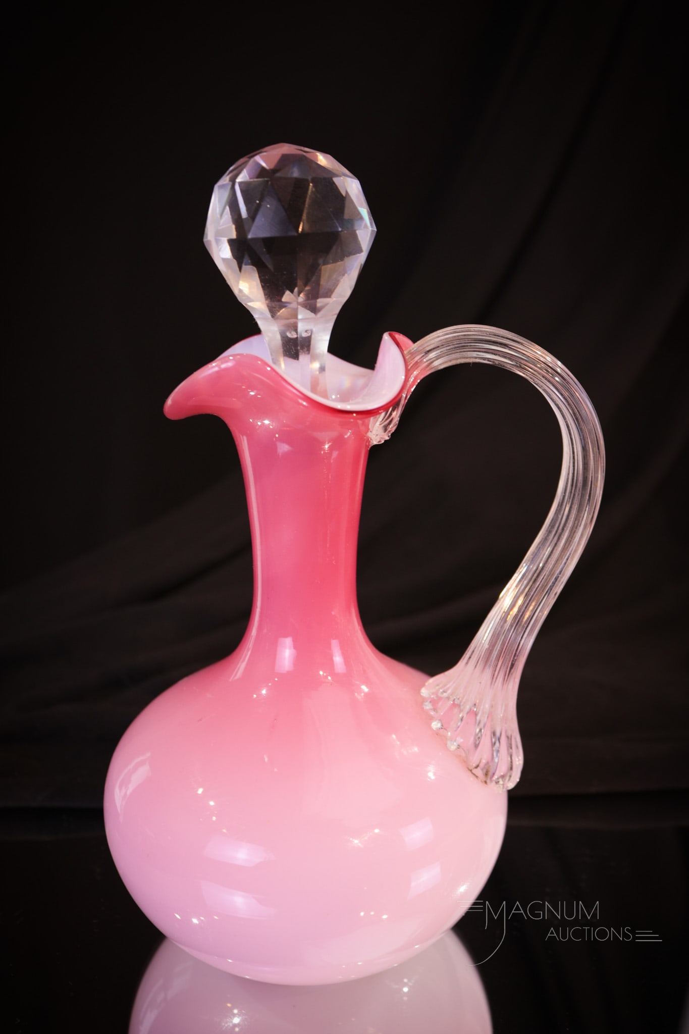 Phoenix Peachblow Cased Glass Victorian Cruet: Gorgeous and oh, so pretty in pink Victorian attributed to Phoenix glass cruet. This cruet has cased crisp white inner lining and graduated pink coloring to the exterior. Finely ribbed reeded handle a