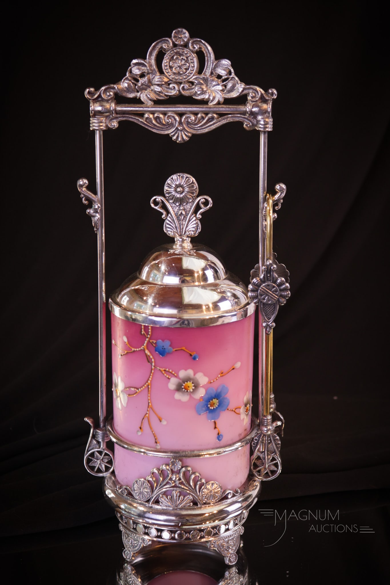 Aurora Silverplate Victorian Pink Satin Enameled Glass Pickle Castor: A wonderful pink satin enameled pickle castor jar in the "Queen Anne" floral pattern. This lovely pickle jar is set in a signed, " Aurora" silverplate pickle castor silverplate frame. Complete it meas