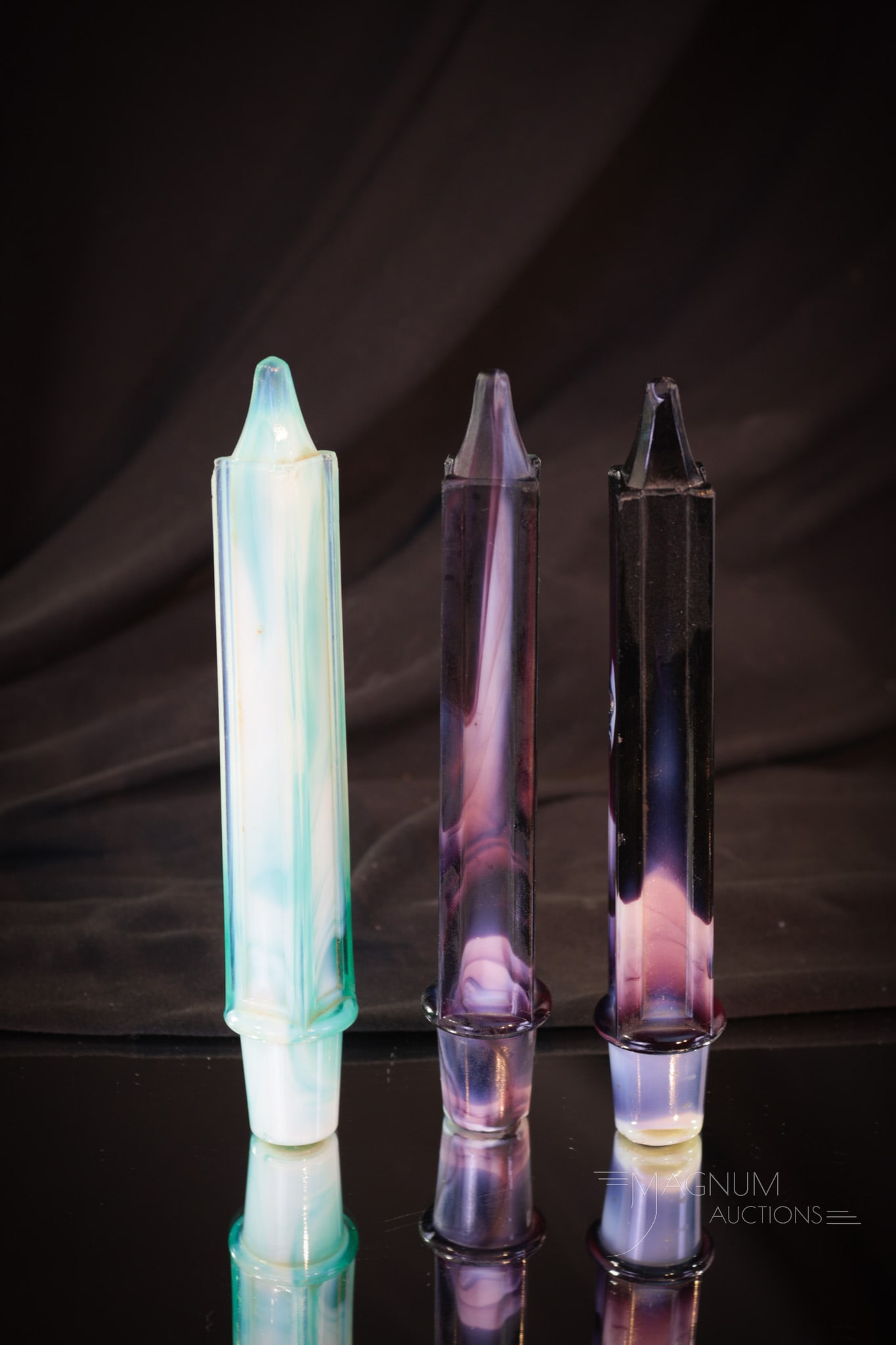 3 pc Lot Rare Challinor Taylor & Co. Slag Glass Candles: Rare lot of three Challinor Taylor and Co. slag glass candles. This offering features two purple and one green. Each is 6 1/2" long.