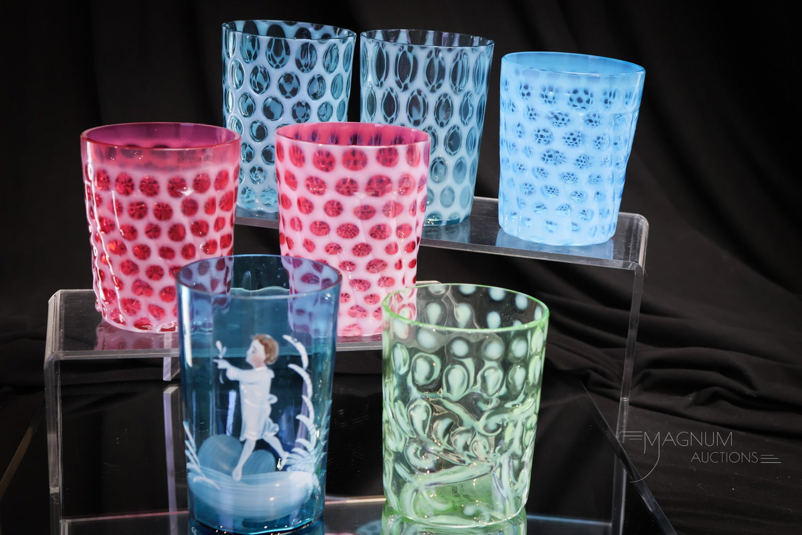 7 pc Lot Victorian Opalescent Glass Tumblers: Seven fine Victorian glass tumblers that are sure to please. Each tumbler a pleasure to behold. Tallest measures 4 1/4". Both of the blue opalescent Honeycomb tumblers exhibit rim roughness.