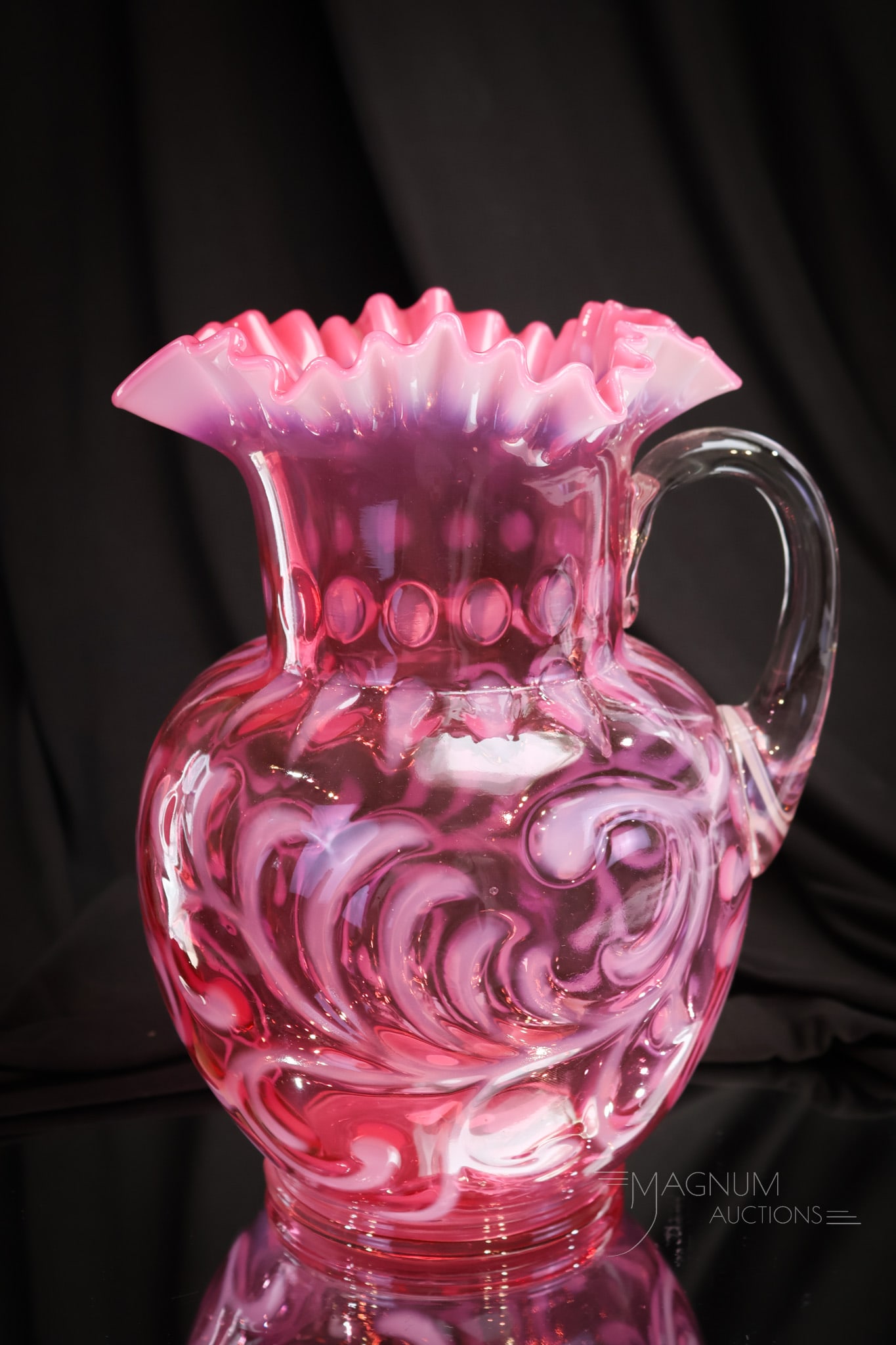 Cranberry Opalescent Buttons & Braids Victorian Glass Pitcher: A show-stopping find for your collection here, folks! This fine pitcher is in the Buttons and Braids pattern. This pitcher has strong cranberry coloring and brilliant opal. Pitcher measures 9 3/4" tal