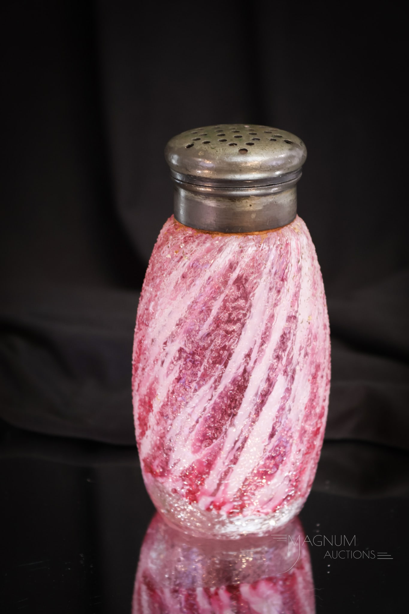Scarce Phoenix Overshot Victorian Glass Spatter Sugar Shaker: A scarce find in Victorian glass sugar shakers. This one in cranberry and white spatter with overshot finish. Shaker is complete with the original top. A nice example! Measures 5 1/2" tall.