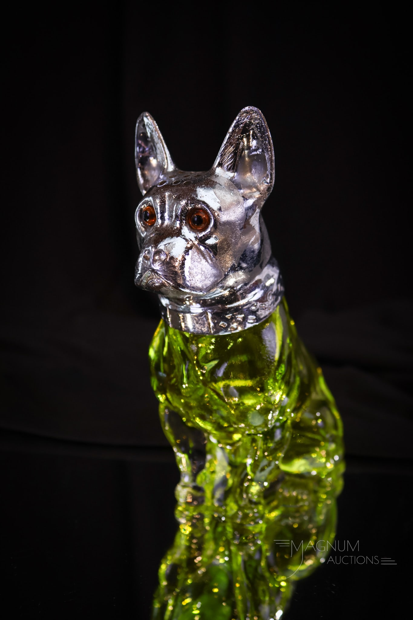 Bulldog Figural Citron Glass Sugar Shaker Muffineer: A highly collectible figural bulldog citron glass sugar shaker or muffineer. This gem retains its original glass eyes. Charming piece. Shaker measures 5 3/4" tall.