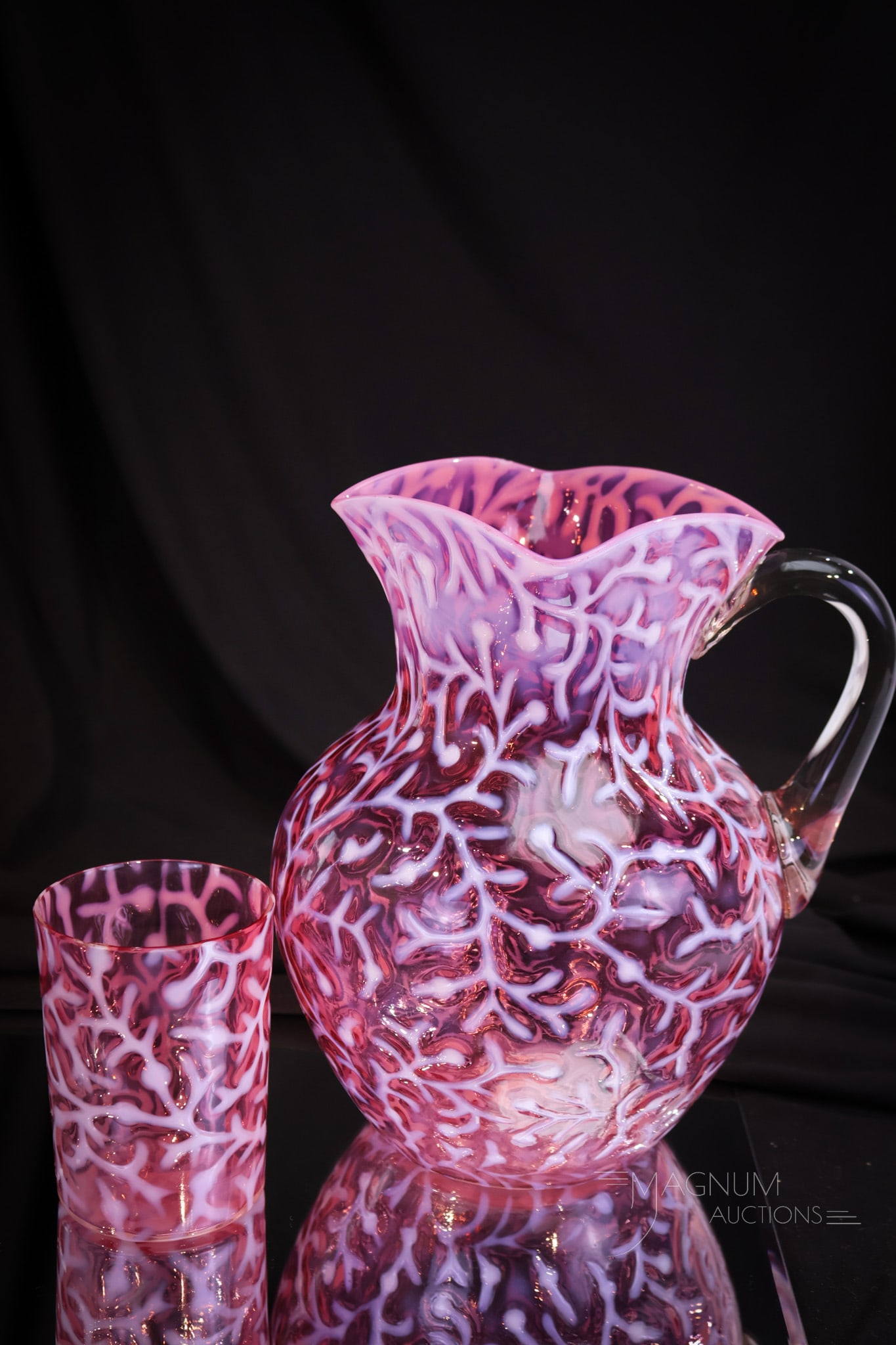 Hobb's Cranberry Opalescent Victorian Glass Water Pitcher & Tumbler: A super example of a tough pitcher to find like this one. This pitcher is by Hobb's and a classic form. This pitcher measures 8 3/4" tall. The pitcher comes with a matching tumbler. Both have great co