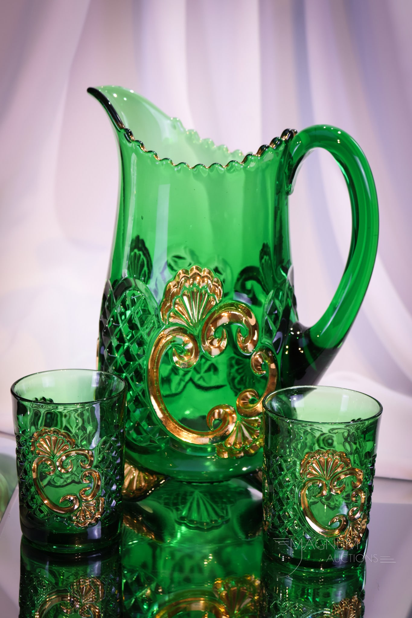 Riverside Croesus Victorian Glass Water Pitcher & Tumblers: Brilliant green Riverside glass at its best. Here's a pitcher with bright gold and two matching tumblers. Pitcher stands tall at 11".