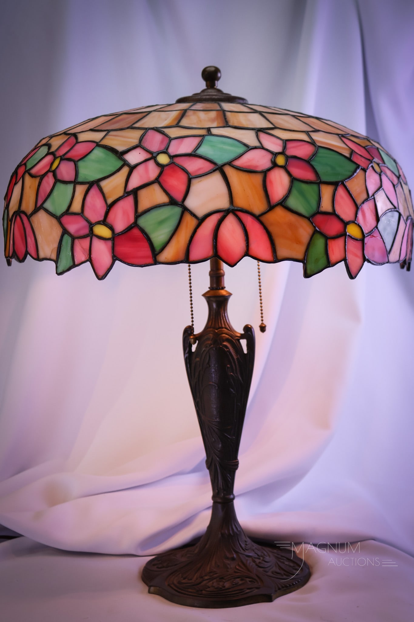 Lamb Bros. Antique Leaded Glass 24" Table Lamp: Here's a fine lamp attributed to Lamb Bros. This example has wonderful coloring and an original patina to the base. This lamp measures 24" tall and 19" diameter. Several cracks are noted to the glass 