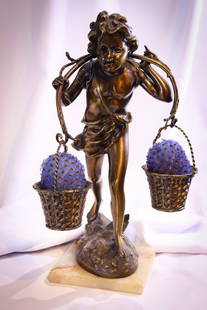 19" Czech Figural Flower Boy Art Deco Table Lamp: This is a wonderful figural spelter Art Deco period antique table lamp on a marble base. This fine example shows a boy carrying baskets of blue flowers. The lamp measures 19" tall and 11" wide.