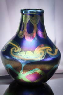 Fantastic Tiffany Studios Art Glass "K1078" Favrile 9" Vase: A large and beautiful Tiffany art glass vase. This vase with incredible coloring and iridescent coloring. Vase is signed, "LCT, K1078." Vase measures 9" tall.