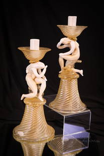 Pair Murano Italian Art Glass Nude 11 1/4" Candlesticks: These are being relisted due to a non-paying and now blocked bidder. This fine pair of Italian Murano art glass candlesticks each features a nude on the stem. Each of these contains gold flakes in the