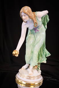 Signed Meissen Porcelain "The Bowler" 12" Porcelain Figurine: A gorgeous signed Meissen porcelain figure titled, "The Bowler." This gilt, phenomenal piece of signed Meissen porcelain would grace any collection. She measures 12" tall.