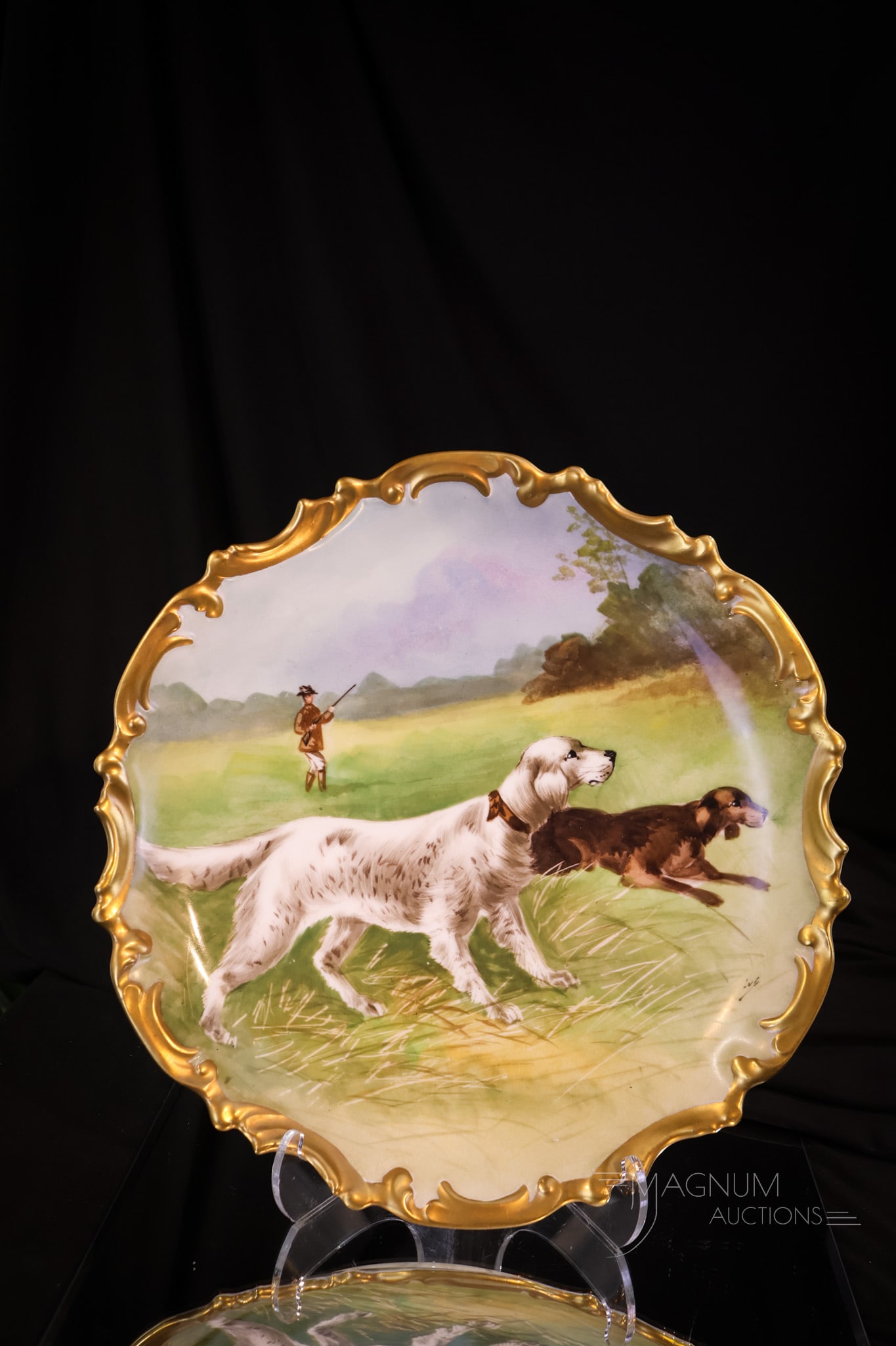 Marked Limoges Rococo Hand Painted Porcelain 12 1/2" Charger: A fine hand-painted charger featuring a hunter and dogs. This super piece measures 12 1/4" in diameter. It is marked Limoges.