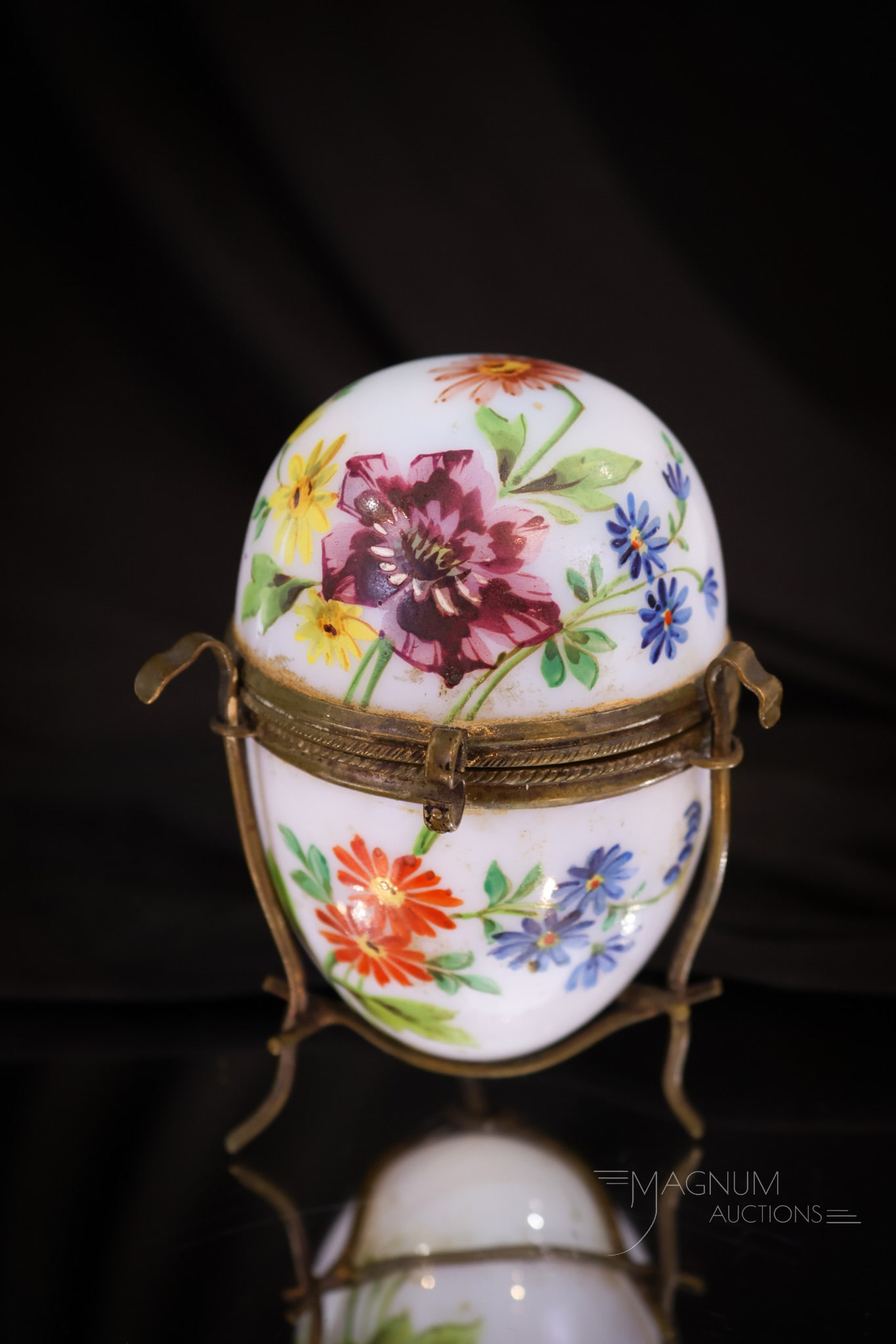 Victorian Enameled Opal Glass Egg Trinket Jewelry Box: Another find in our lineup of egg trinkets and jewelry boxes. This example is in opal glass with colorful enameled flowers. This charmer measures 4" tall.