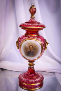 Very Rare Moser Cranberry Art Glass & Porcelain Portrait 14 1/2" Covered Urn: A very rare find in this Moser Bohemian art glass 14 1/2" tall covered urn with portrait. This super example has an applied plaque of porcelain with a hand-painted young lad. Rarely do you ever see th