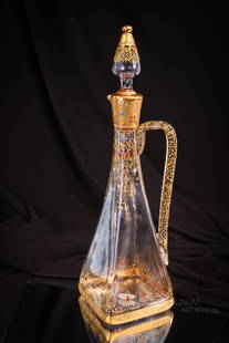 Victorian 13 1/2" Moser Crystal Gilt Enameled Claret Decanter: A beautiful find in Moser Victorian glass. This is a 13 1/2" tall enameled and gilt crystal claret decanter. A select offering that is sure to please.