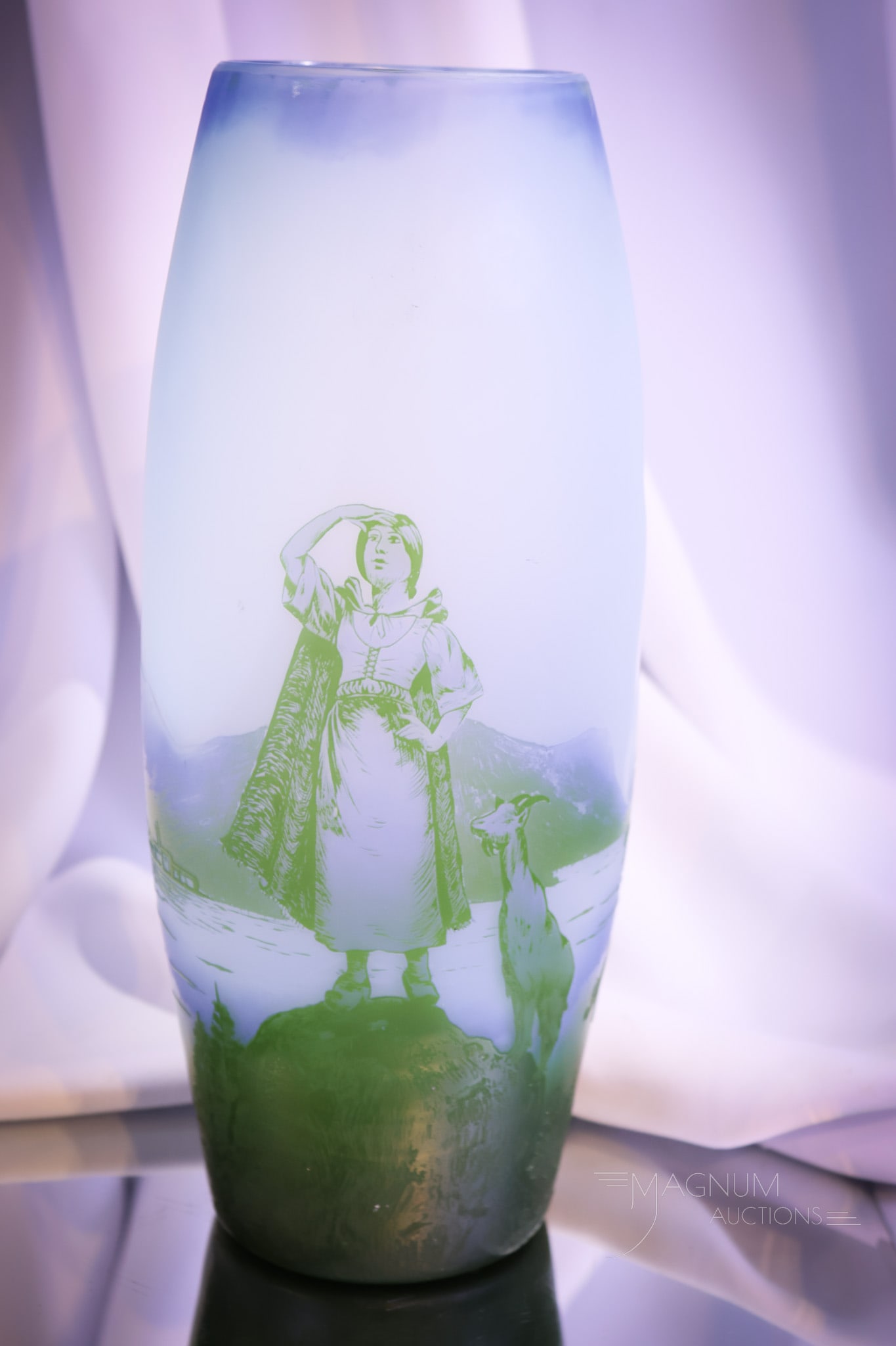 Signed Devez French Cameo Art Glass 12" Vase: Here's a beautiful and fine signed "Devez" French cameo art glass vase. This vase features goat and mountain lake scenes in wonderful blues and greens. This vase measures 12" tall.