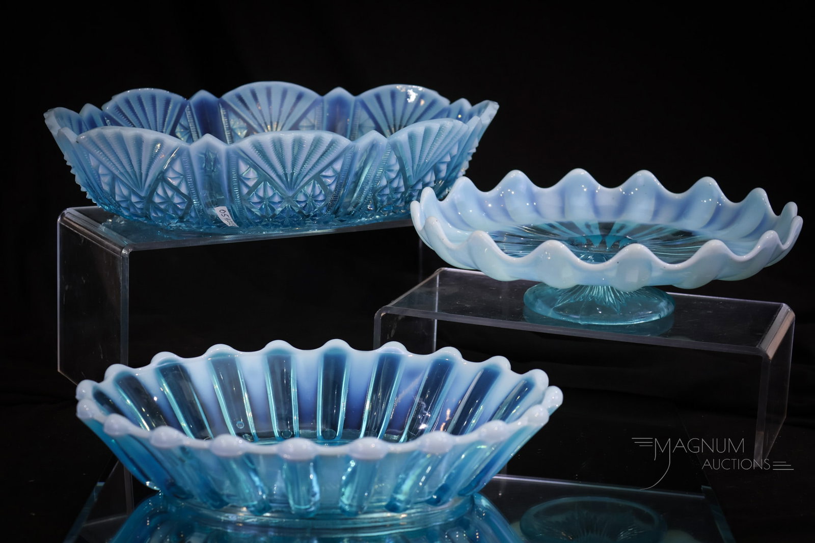 3 pc Lot Davidson Blue Opalescent Victorian Glass: Three select finds in Davidson Victorian blue opalescent glass. These fine pieces are beautiful and surely collection-enhancing. There are two oval bowls and one compote. The tallest of the lot measur