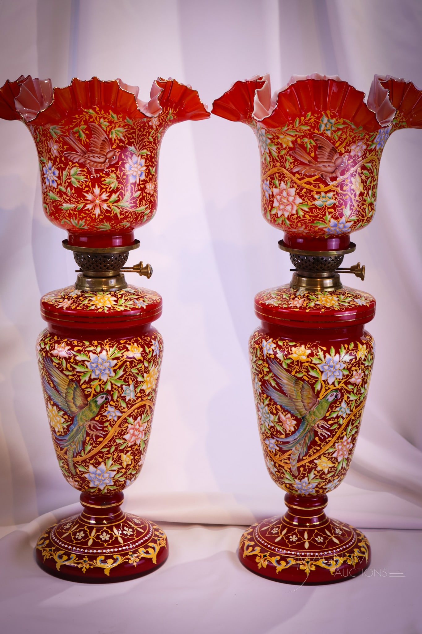 Fantastic Pair 27" Bohemian Cased Enameled Glass Chinese Red Oil Lamps: This is a fantastic matched pair of 27" tall and 10" wide Bohemian-cased enameled art glass oil lamps. These lamps are incredibly beautiful. Each lamp is comprised of the base, drop-in font, and match
