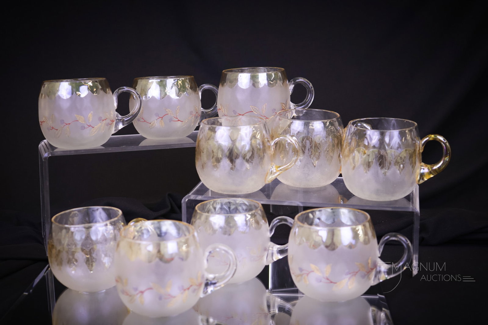10 pc Lot Victorian New England Glass Pomona Punch Cups: A generous offering of ten Victorian New England Glass Pomona punch cups. Six have the blueberry and leaf decoration. Four have the acanthus leaf decoration. The largest measures 2 1/2"" tall and 3 1/