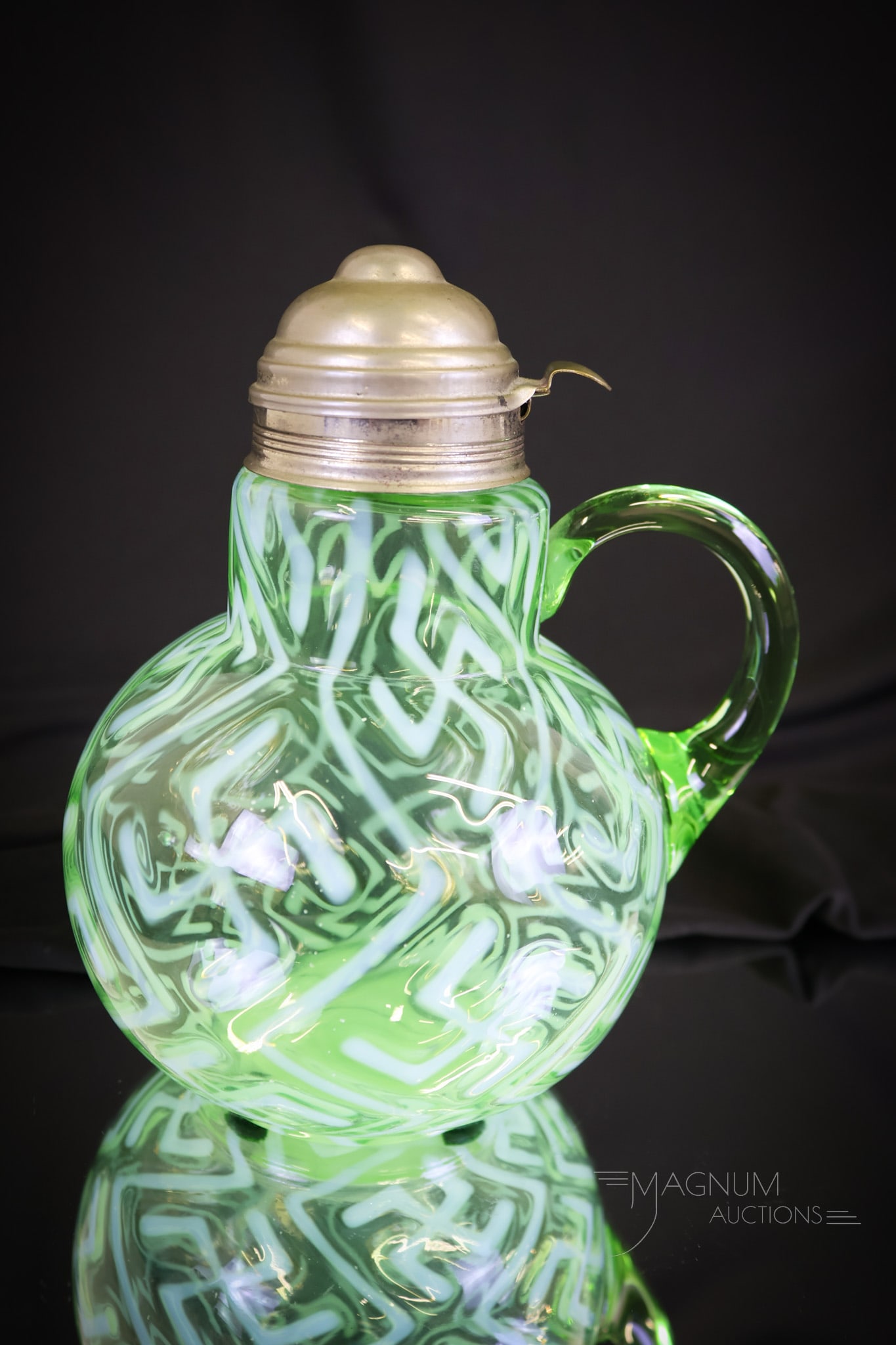 Rare Northwood Green Opalescent Swastika Victorian Glass Syrup Pitcher: A rare find folks! This is a Northwood syrup pitcher in the Swastika pattern. This syrup has excellent color and opal and is exceedingly rare. Will you be the lucky owner? This piece measures 6"" tall