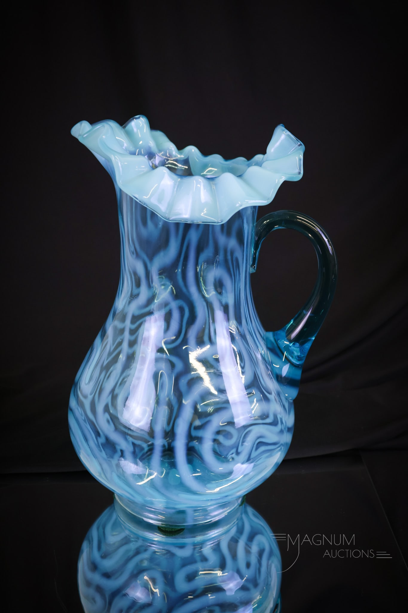 Jefferson Blue Opalescent Swirling Maze Victorian Glass Tankard Pitcher: Here's a heavenly blue Jefferson Swirling Maze Victorian tankard pitcher. This is a super example and seldom found. Great color and opal makes this a must-have piece. This pitcher measures 11"" tall a